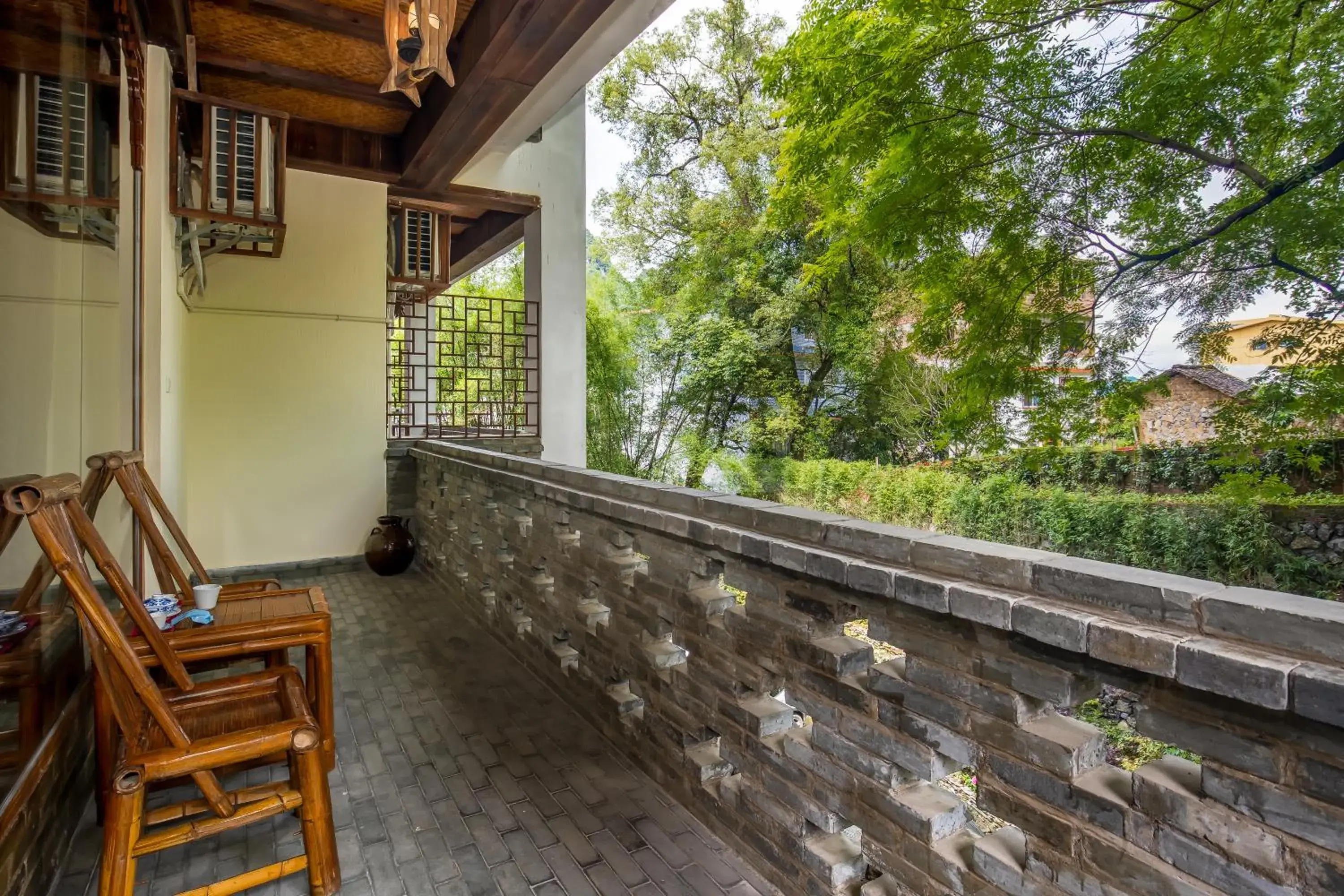 Deluxe Twin Bed Room in Yangshuo River Lodge Hotel - Airport or TS Free pick up over 3 nights Deluxe Twin Bed Room in Yangshuo River Lodge Hotel - Airport or TS Free pick up over 3 nights