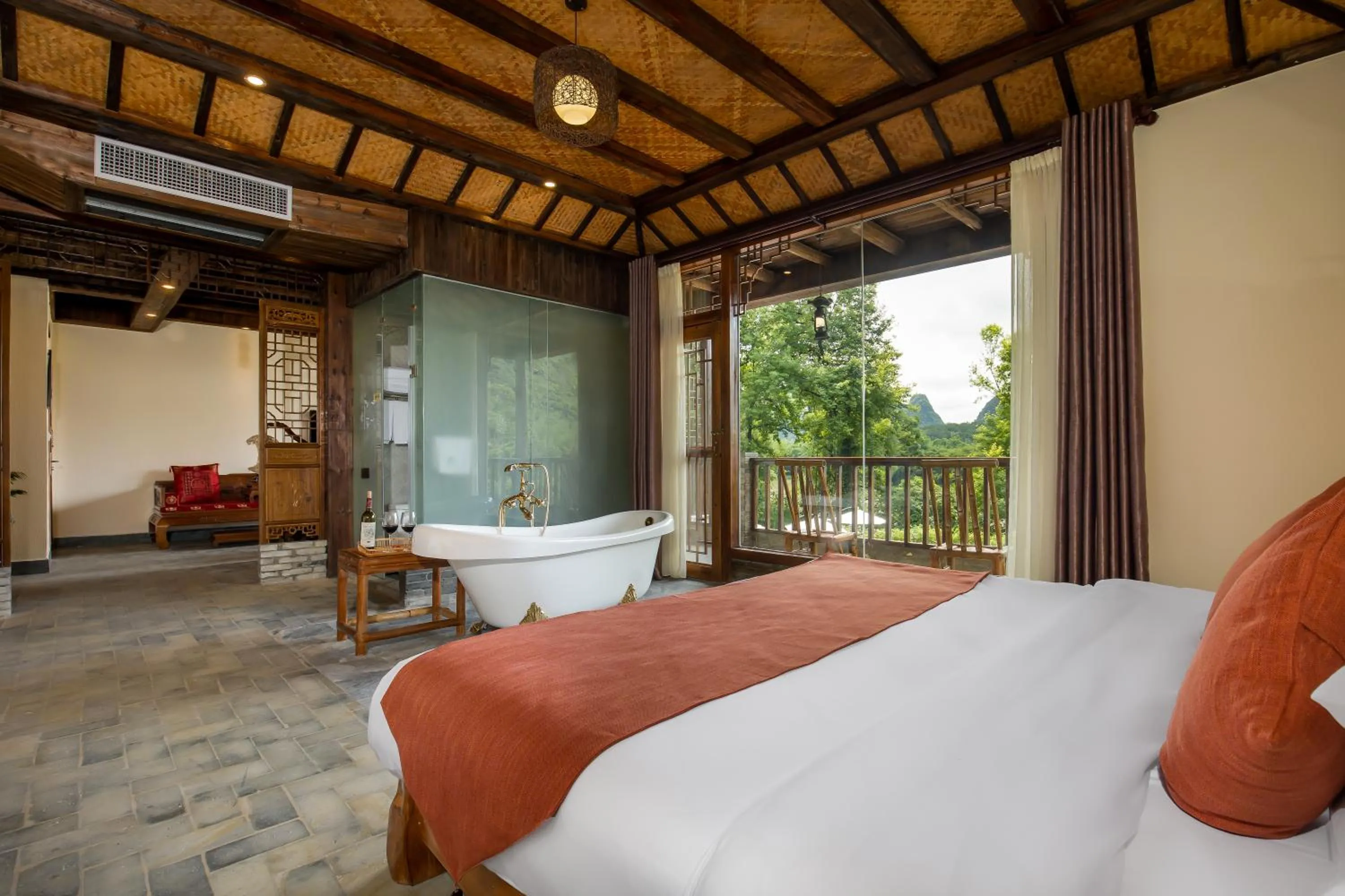 Photo of the whole room, Bed in Yangshuo River Lodge Hotel - Airport or TS Free pick up over 3 nights