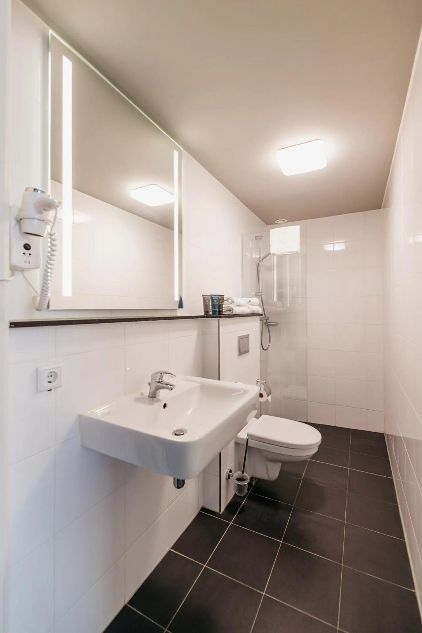 Bathroom in YAYS Amsterdam Maritime by Numa