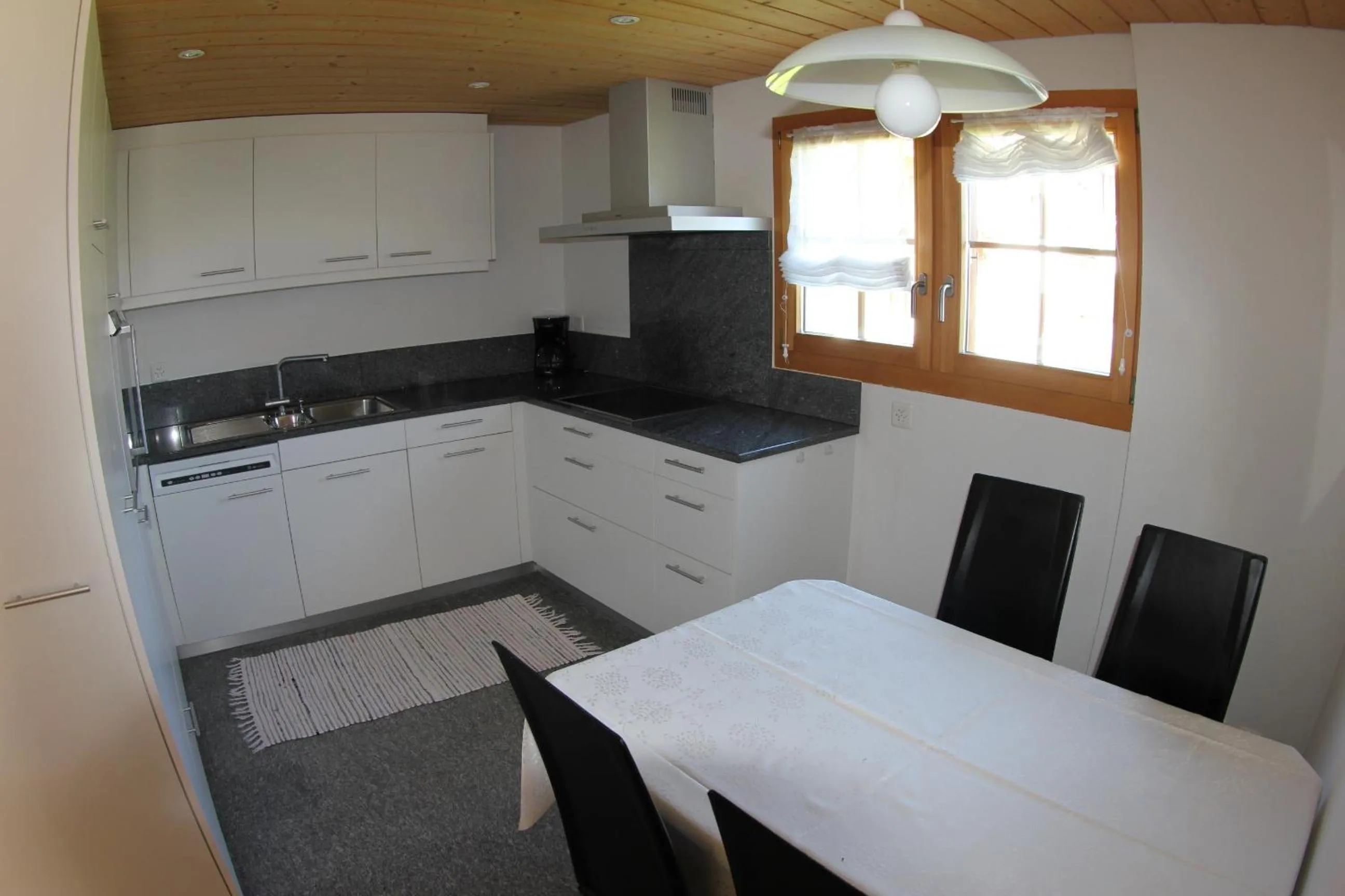 Kitchen or kitchenette in Ferienwohnung Rigoleth