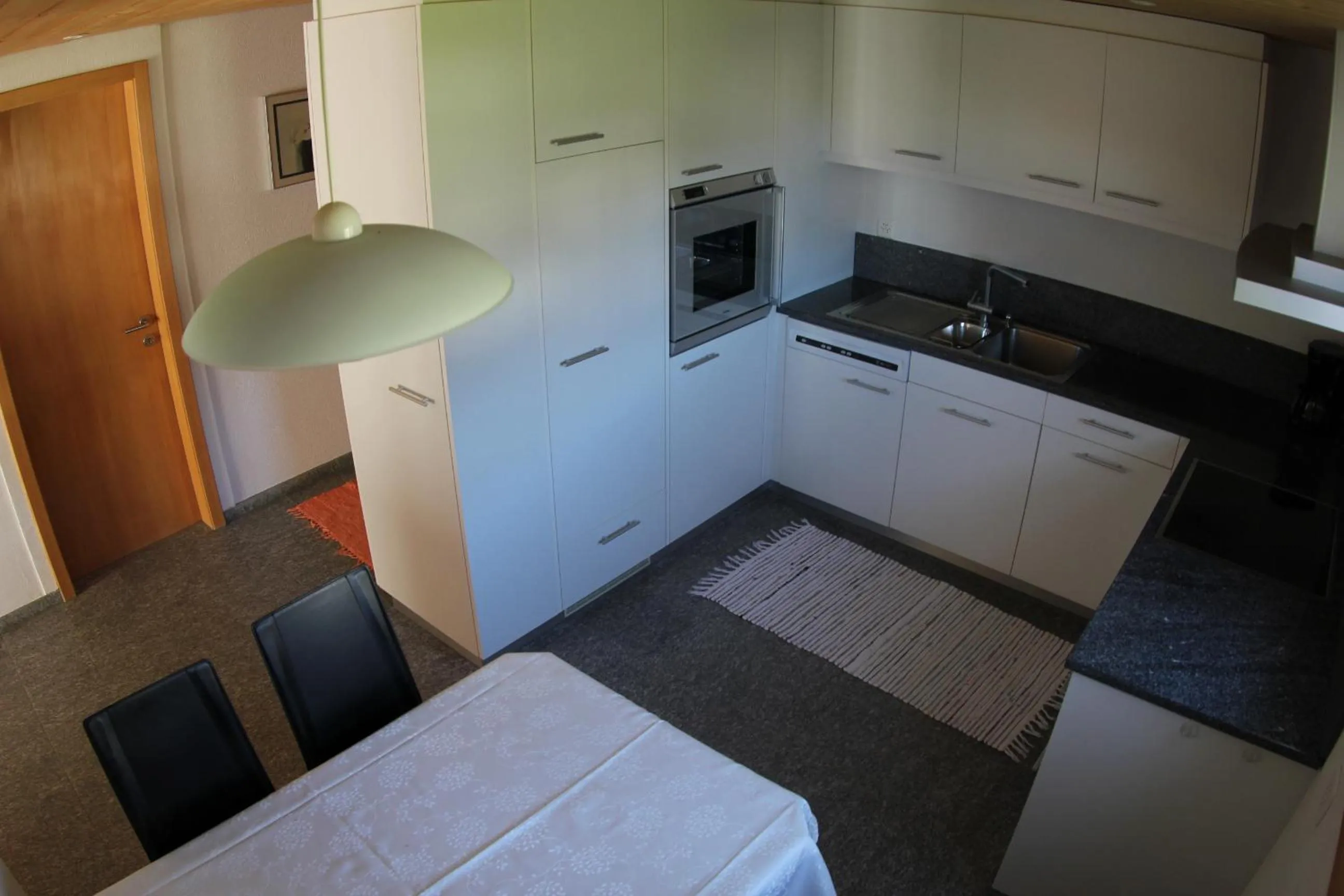 Kitchen or kitchenette in Ferienwohnung Rigoleth
