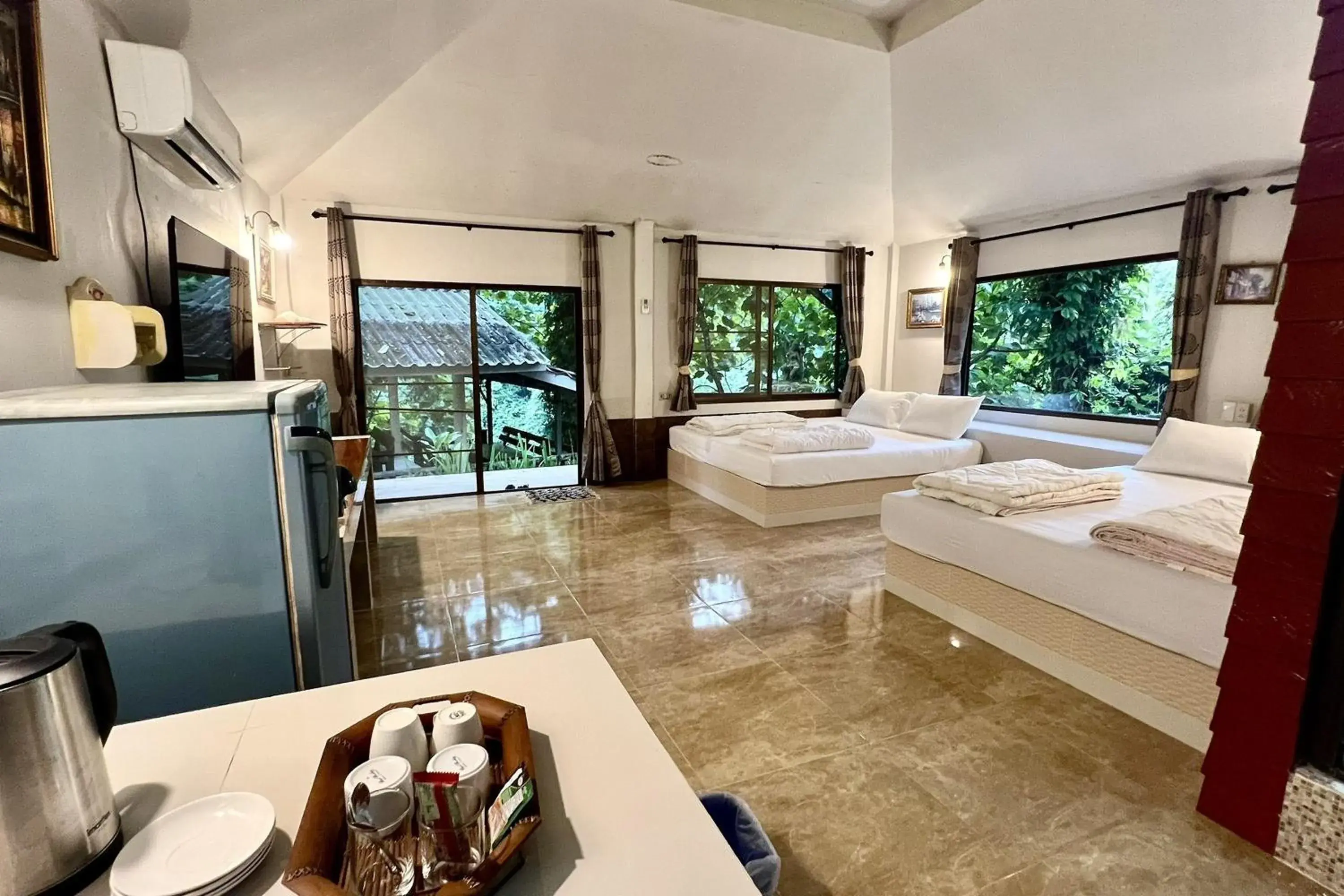 Bed in The Cascade - Mae Taeng Waterfall Bungalows Bed in The Cascade - Mae Taeng Waterfall Bungalows