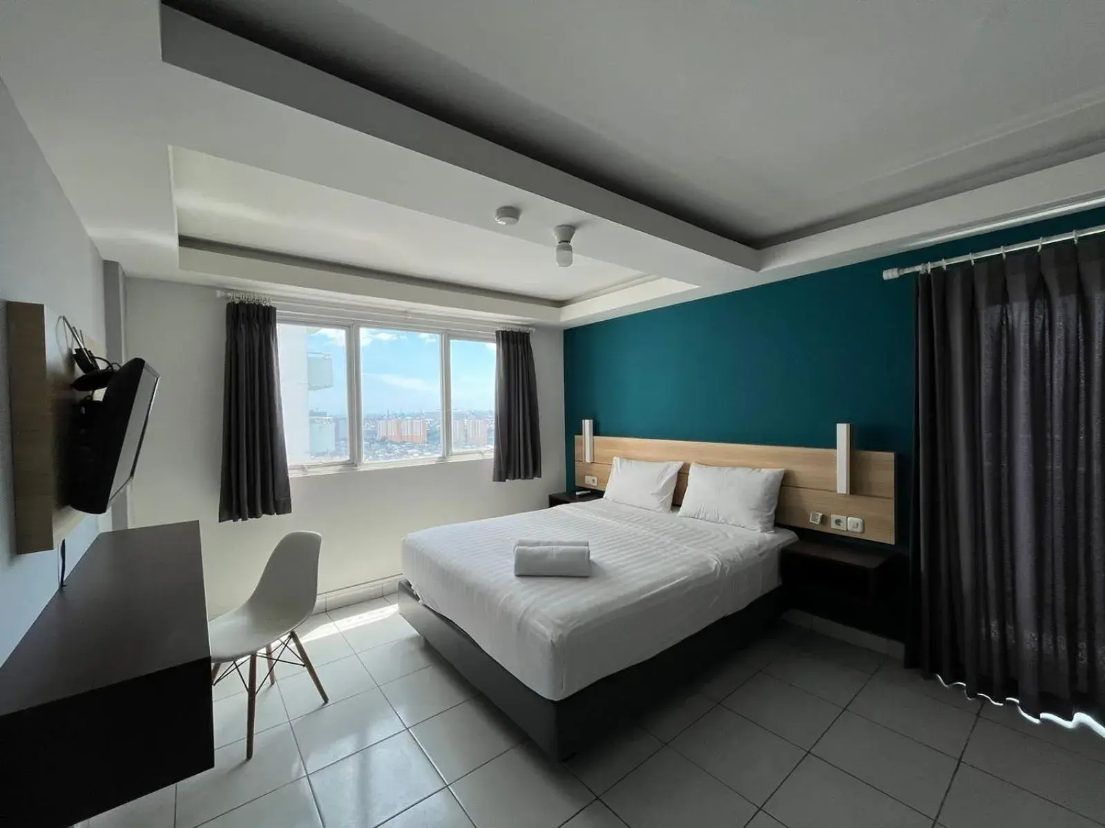 Standard Double Room in Izi Cozi Kemayoran Powered by Archipelago Standard Double Room in Izi Cozi Kemayoran Powered by Archipelago