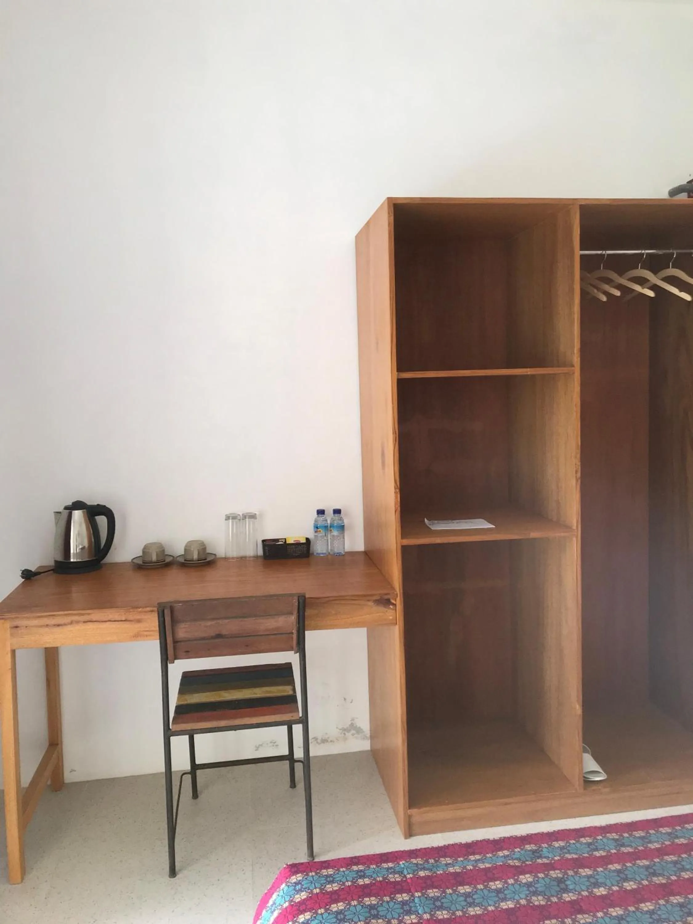 wardrobe in Palmhouse Boutique Hotel