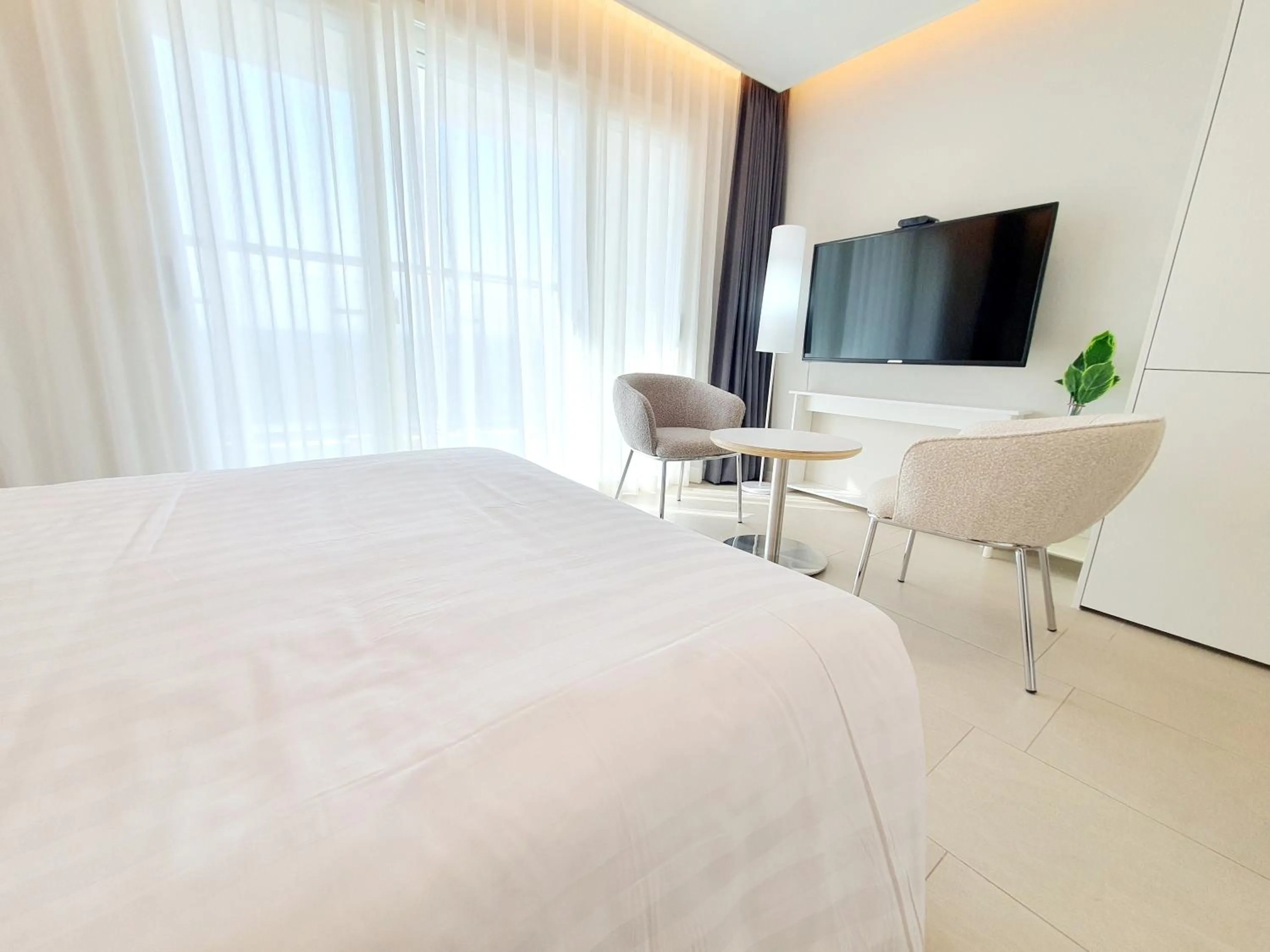 Bed in Le Bleu Naksan by Orot