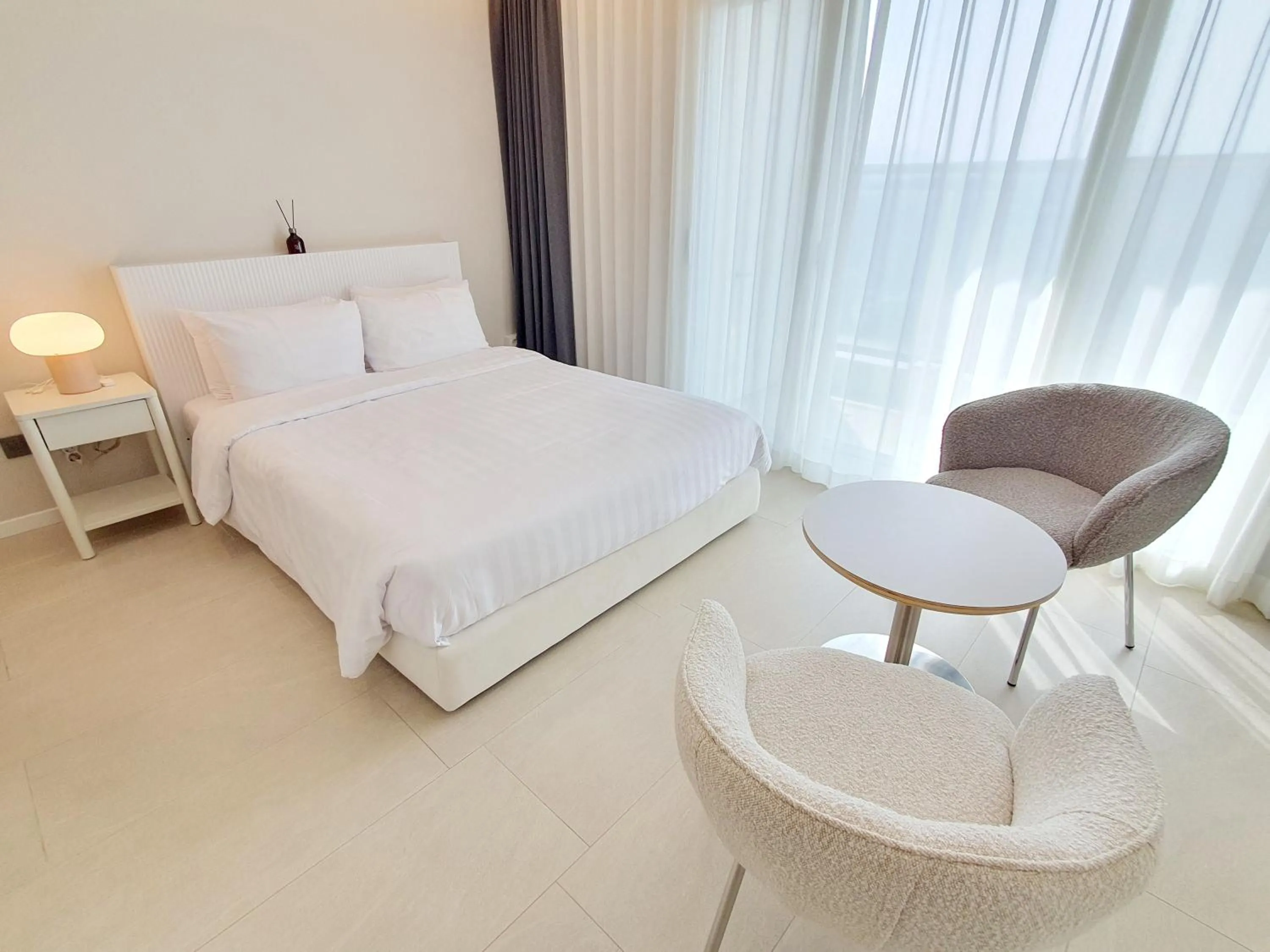 Bed in Le Bleu Naksan by Orot