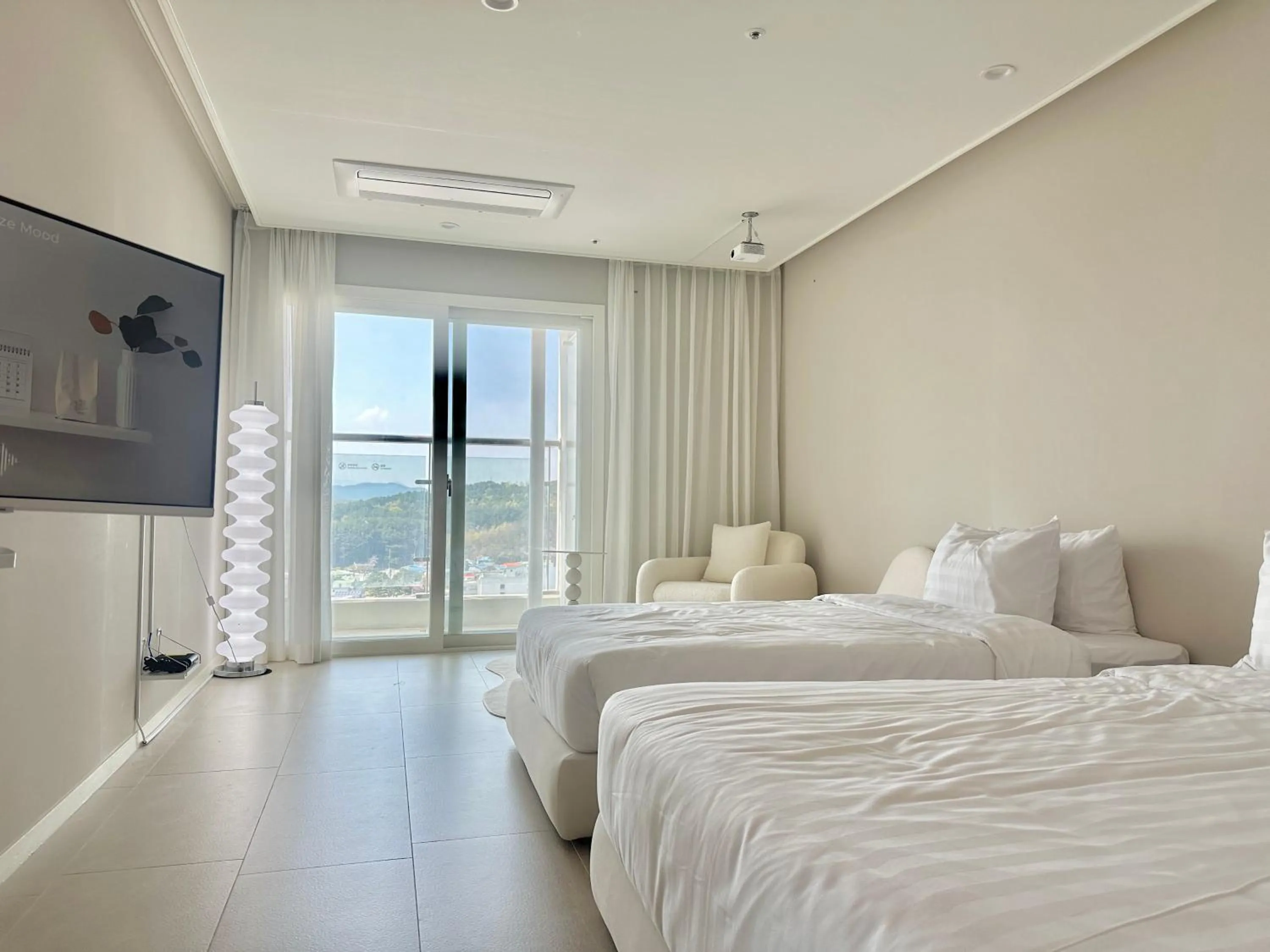 Bed in Le Bleu Naksan by Orot