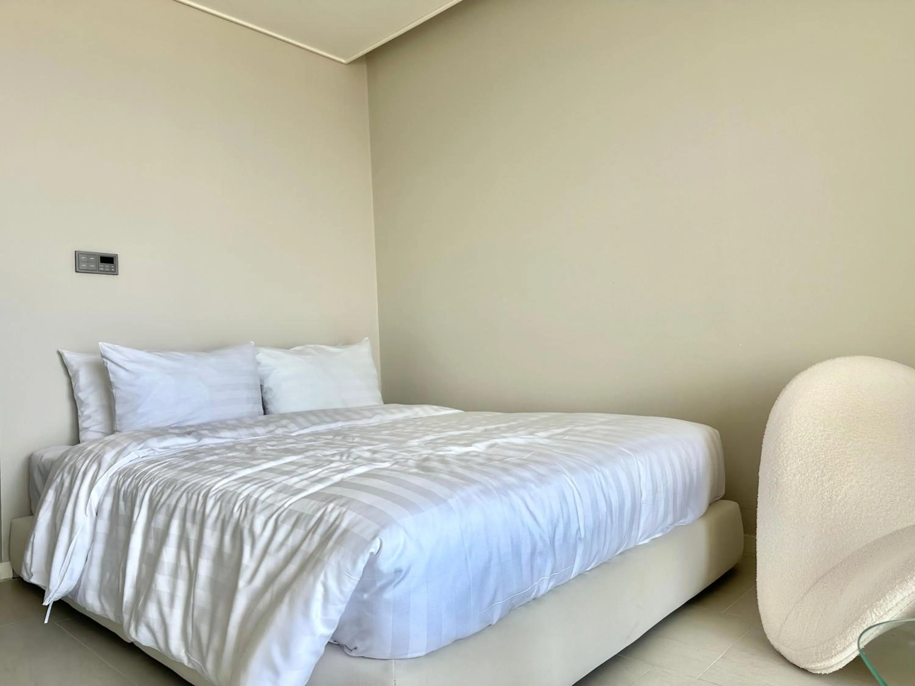 Bed in Le Bleu Naksan by Orot