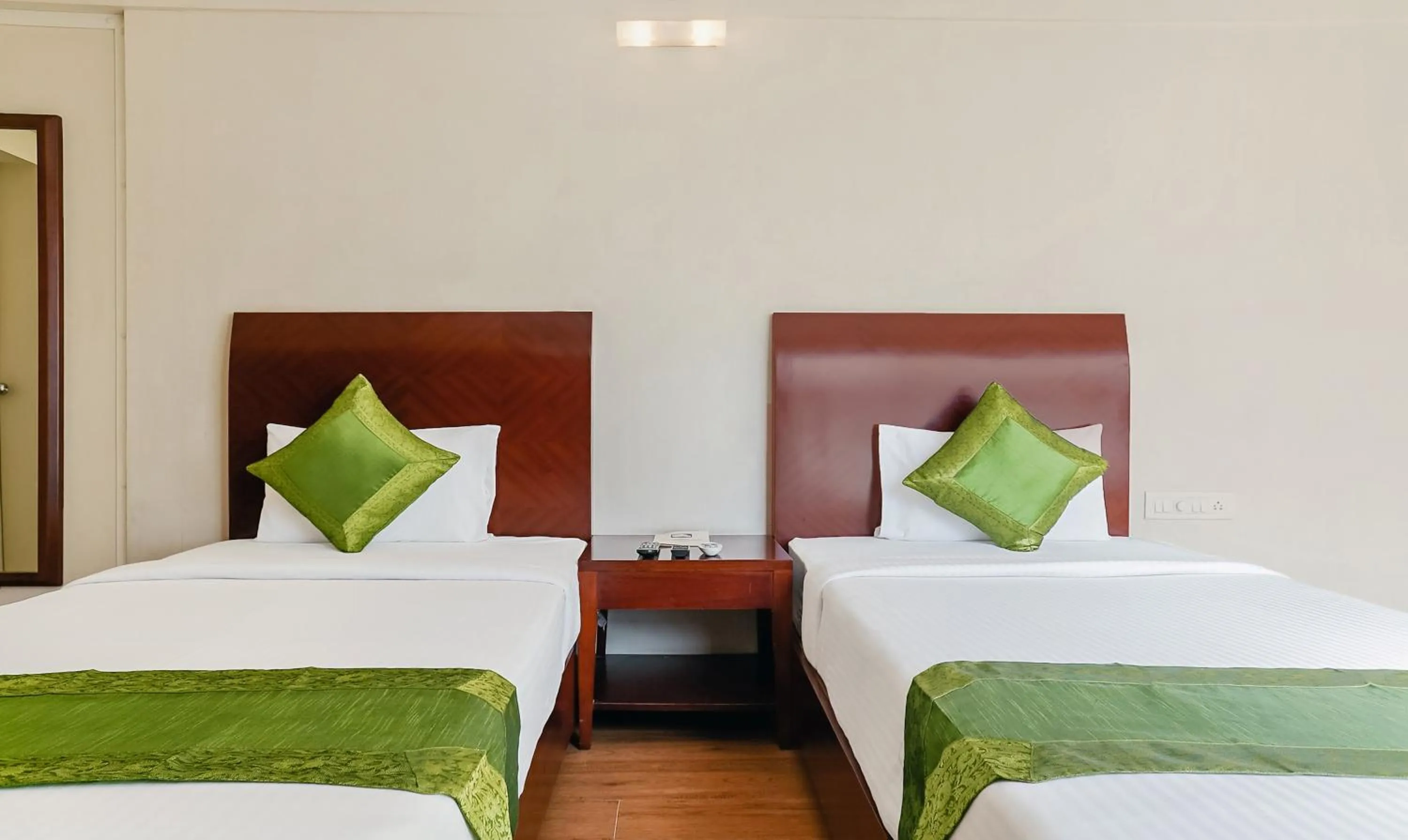 Bedroom, Bed in Treebo Brooks Manor