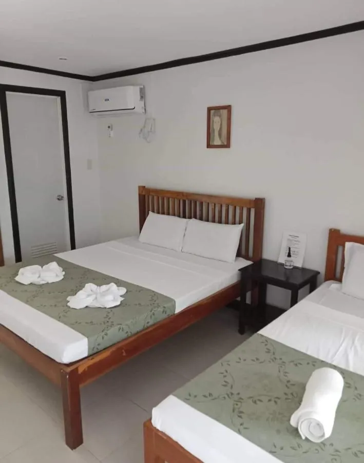 Bed in Sunday flower hotel and beach resort