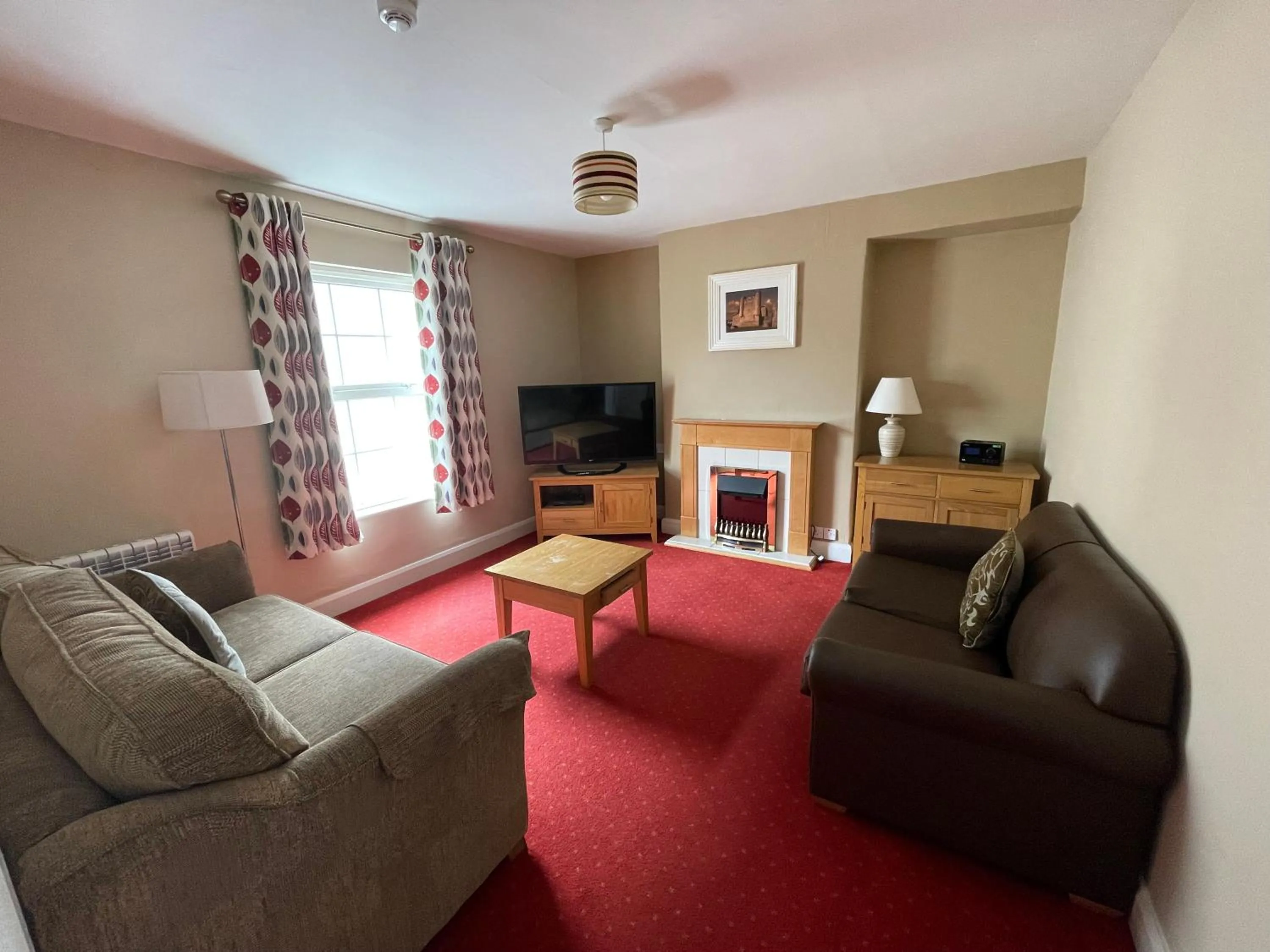 Living room in Belmore Court & Motel