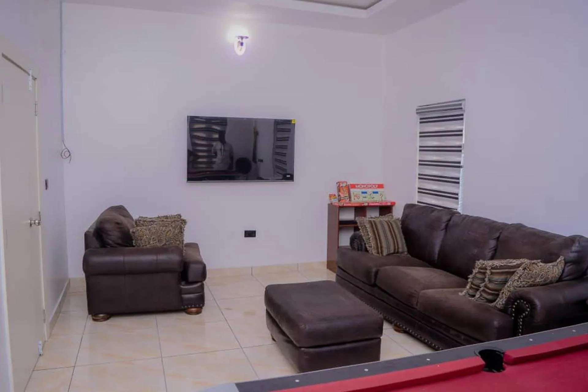 TV and multimedia in Bamgbose Apartments - Sleeps 2 - Balcony - Parking