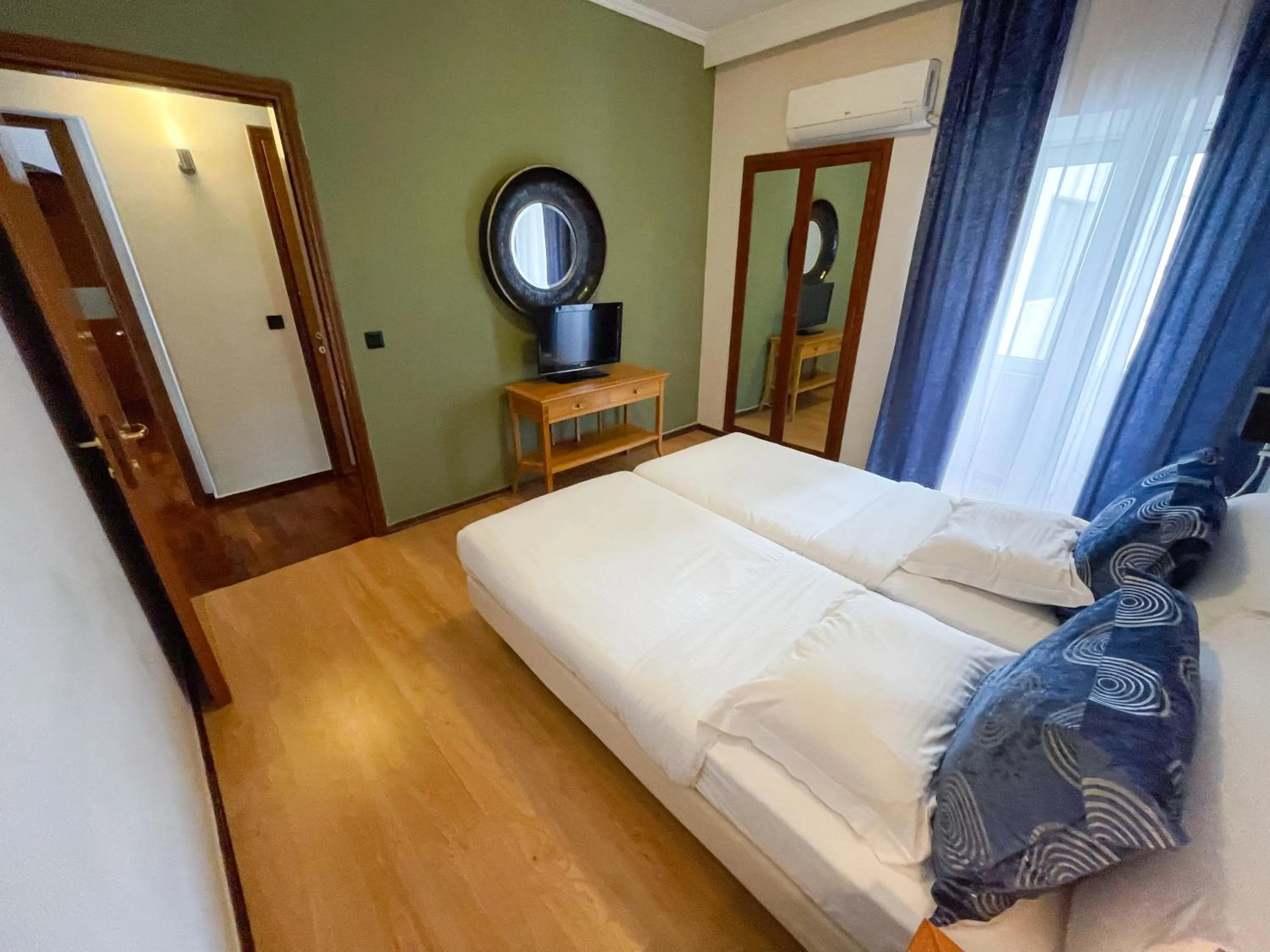 Bedroom, Bed in Andromeda Suites