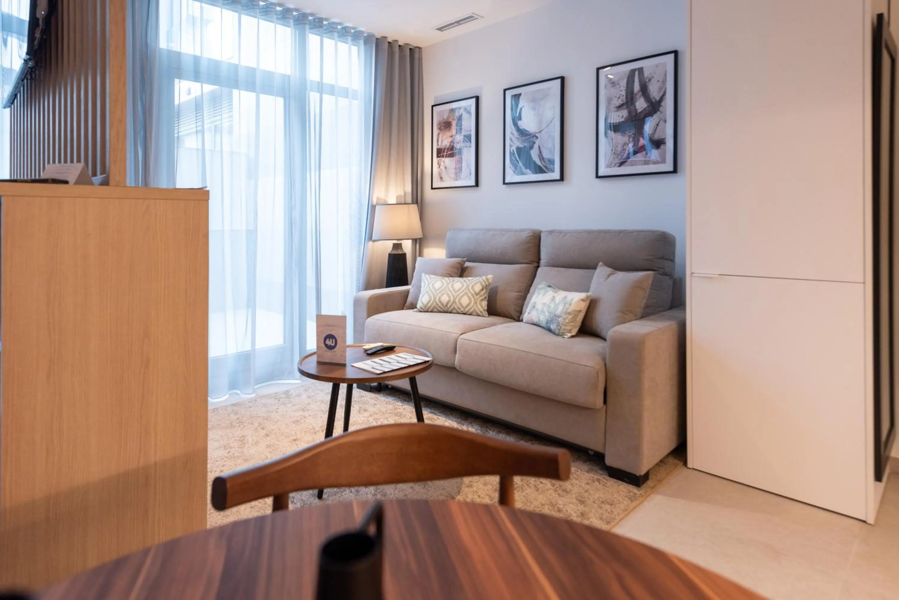 Living room, Bed in Dorm4You Arena