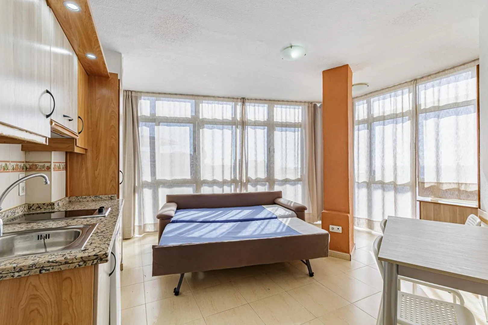 Living room, Bed in Apartamentos Doramar