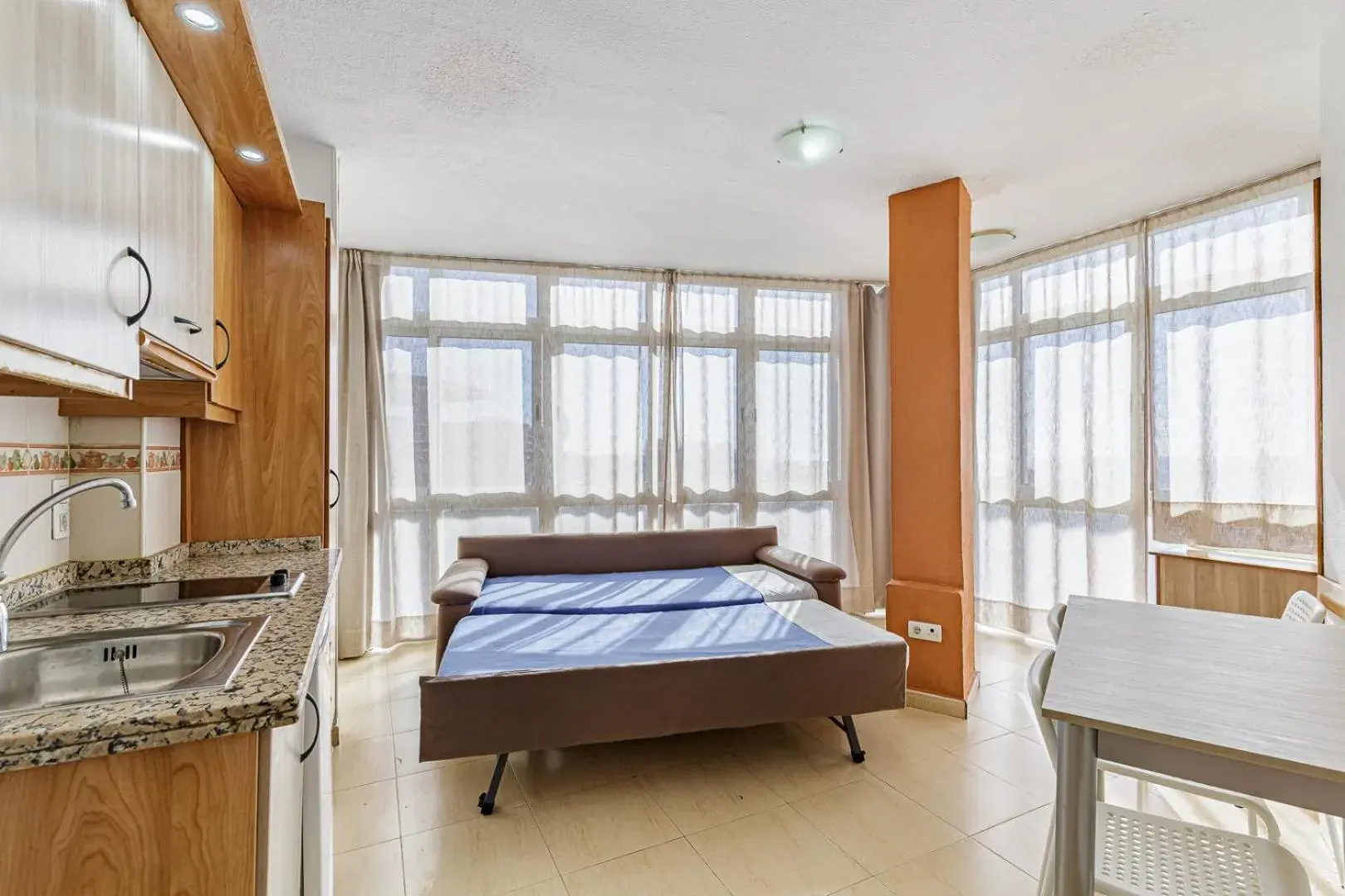 Living room, Bed in Apartamentos Doramar Living room, Bed in Apartamentos Doramar