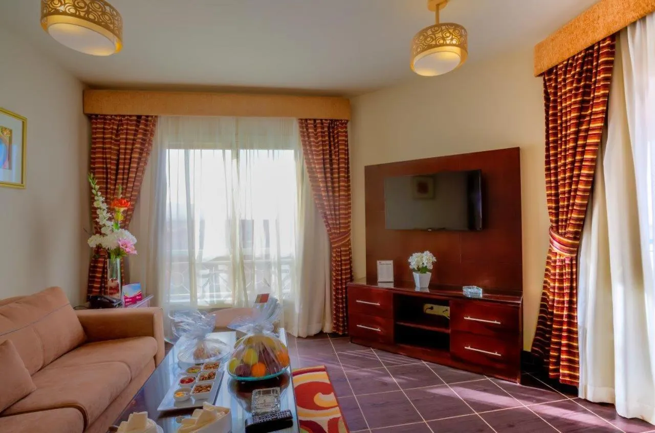 Seating area in Porto South Beach by Amer Group - Families only