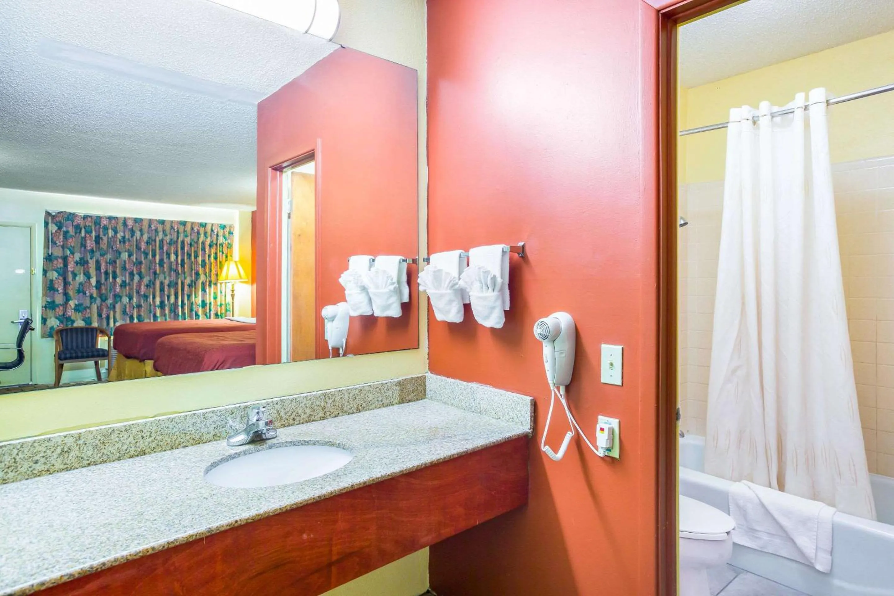 Bedroom in Rodeway Inn