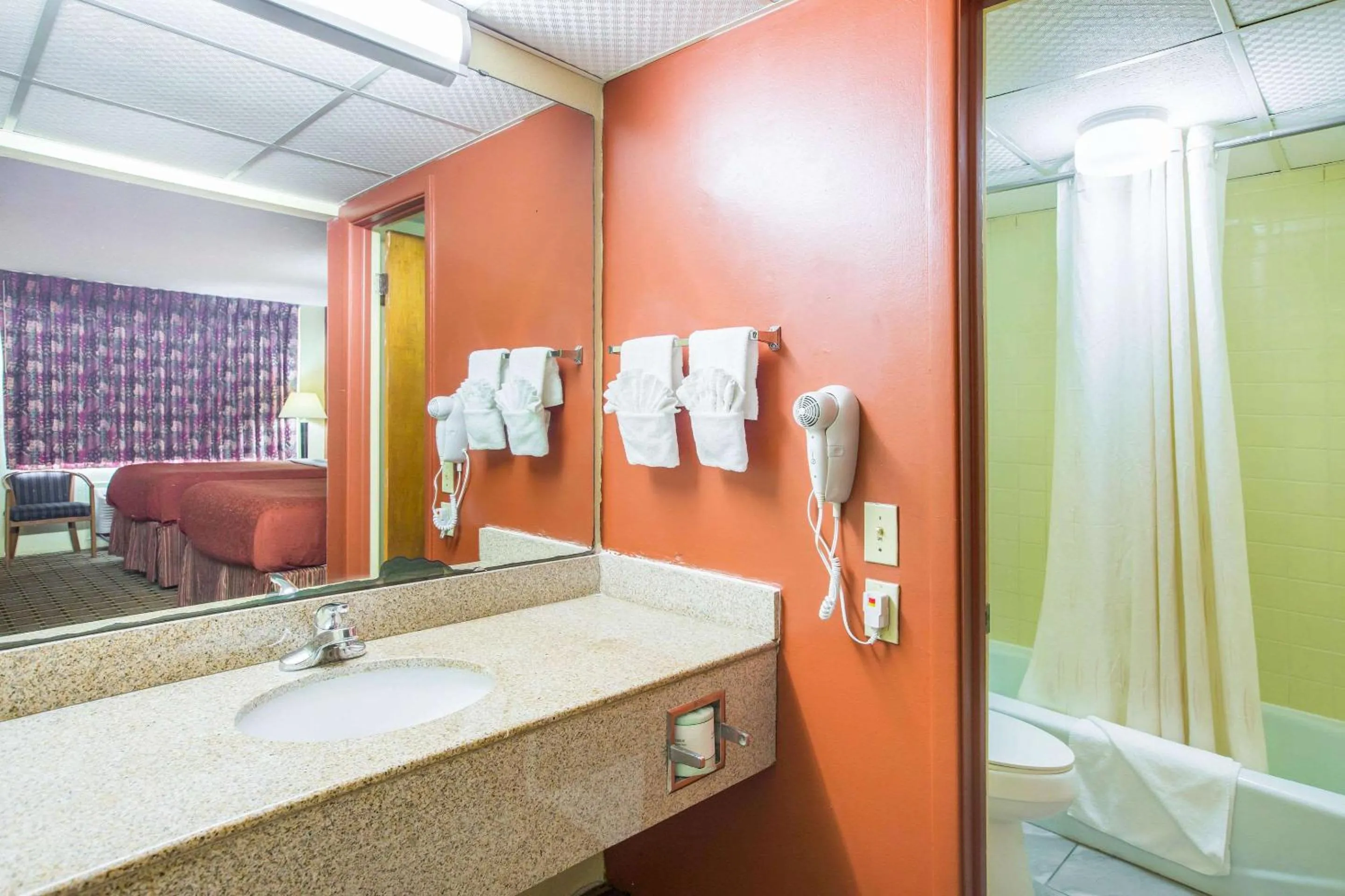 Bedroom in Rodeway Inn