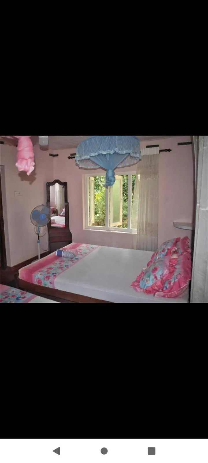 Bed in Deniyaya Guest House