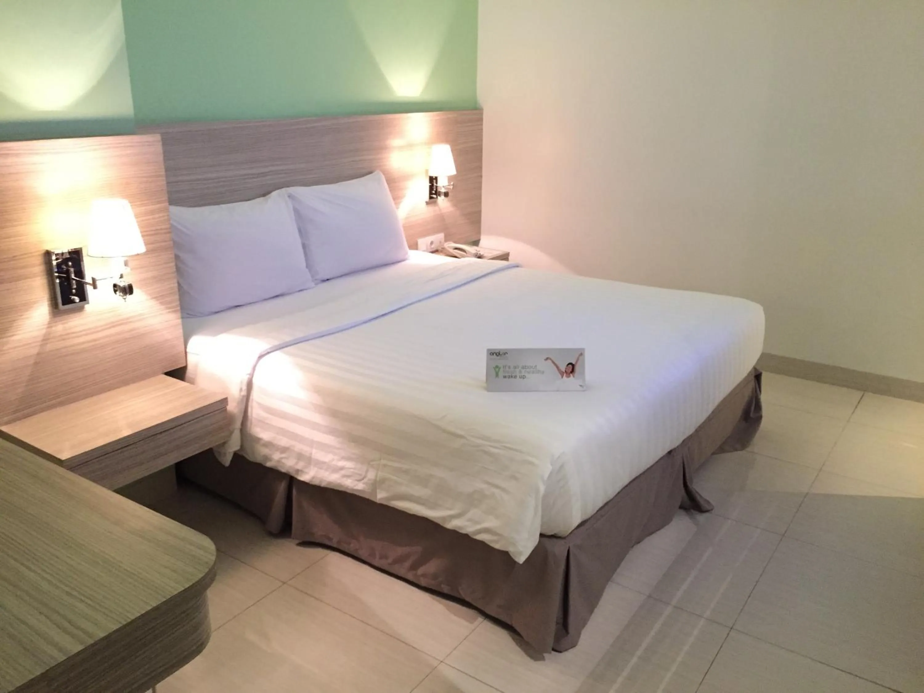 Bed in Whiz Prime Hotel Kelapa Gading