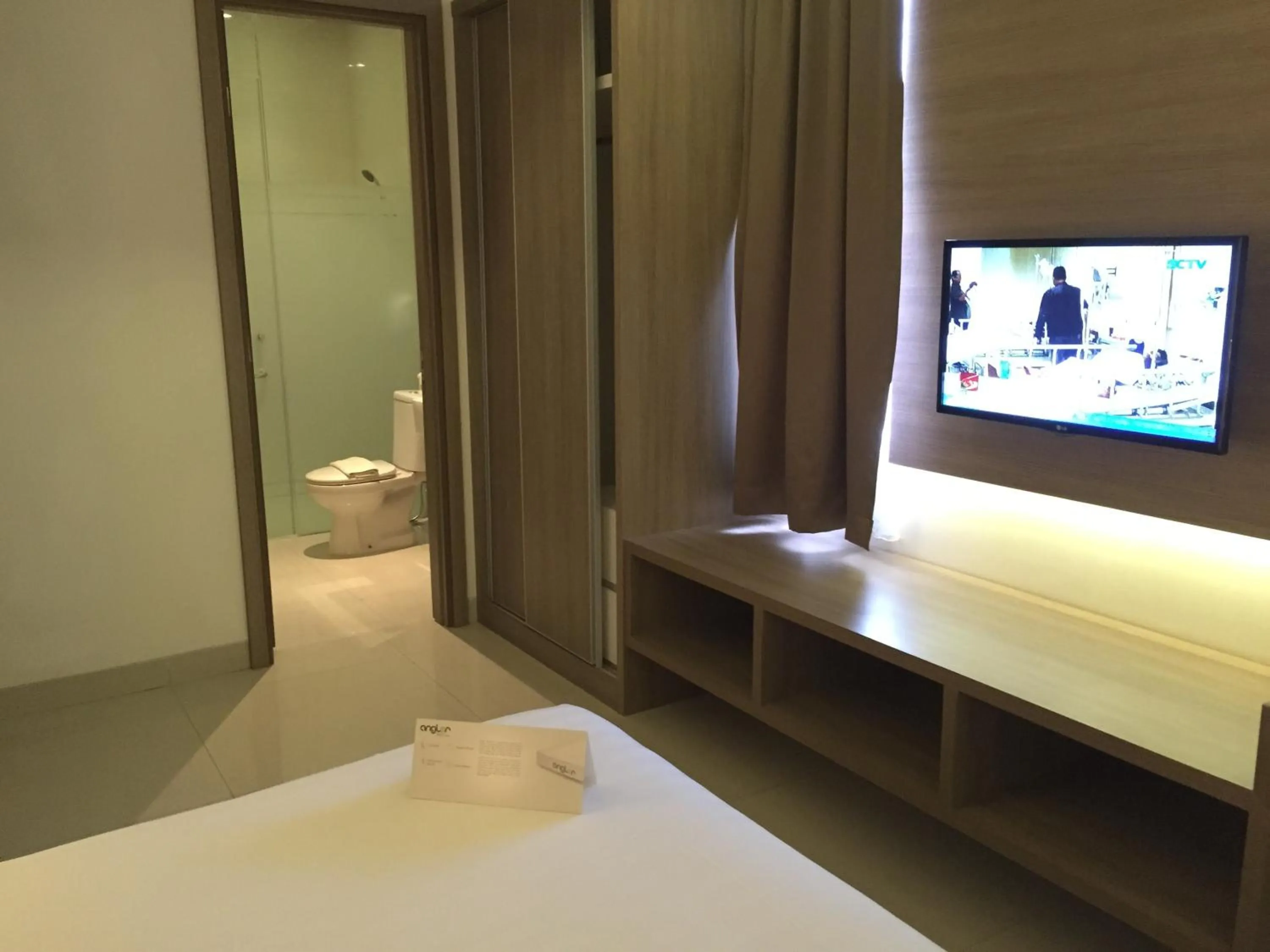 TV and multimedia, Bed in Whiz Prime Hotel Kelapa Gading