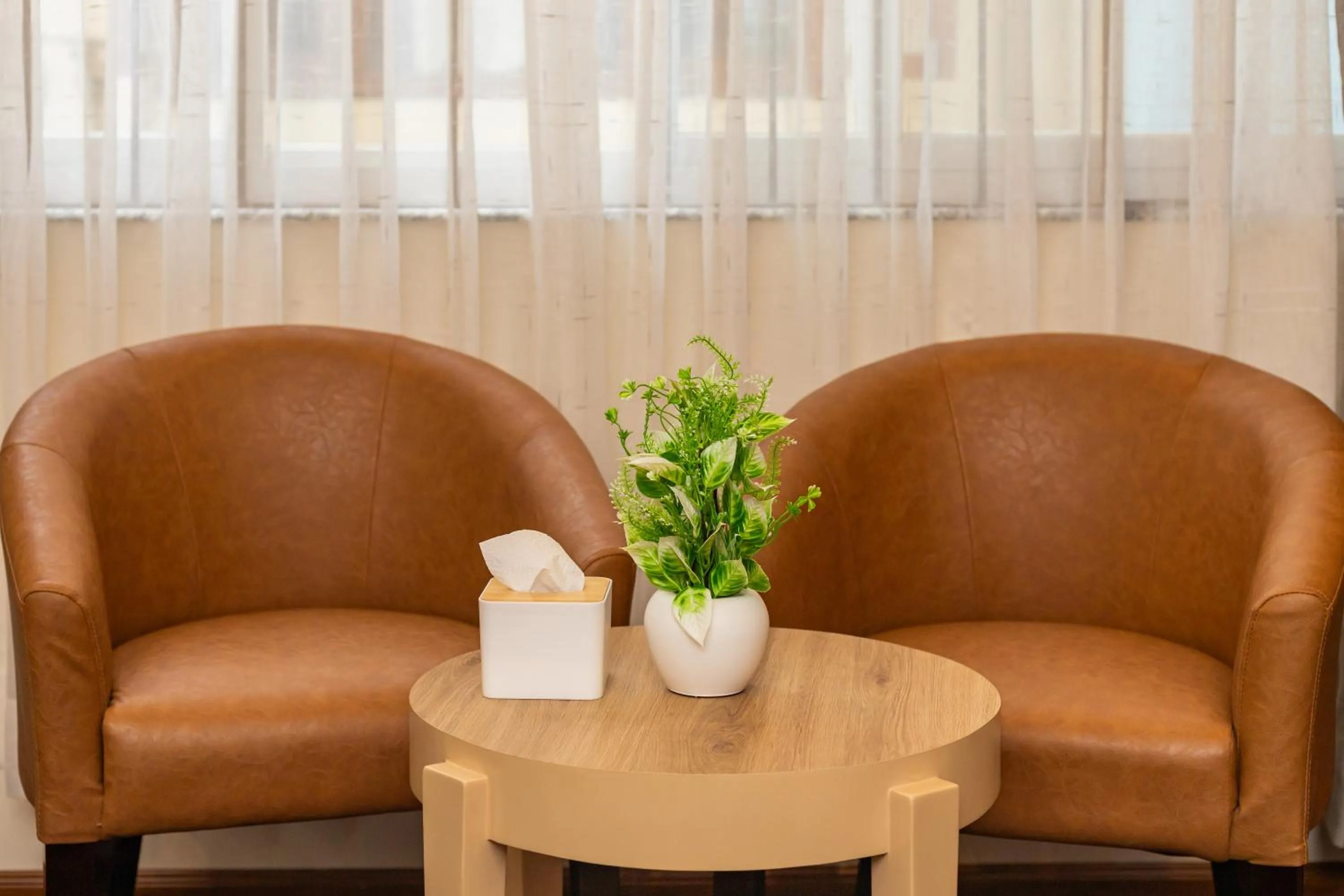 Seating area in Airport Diana Hotel