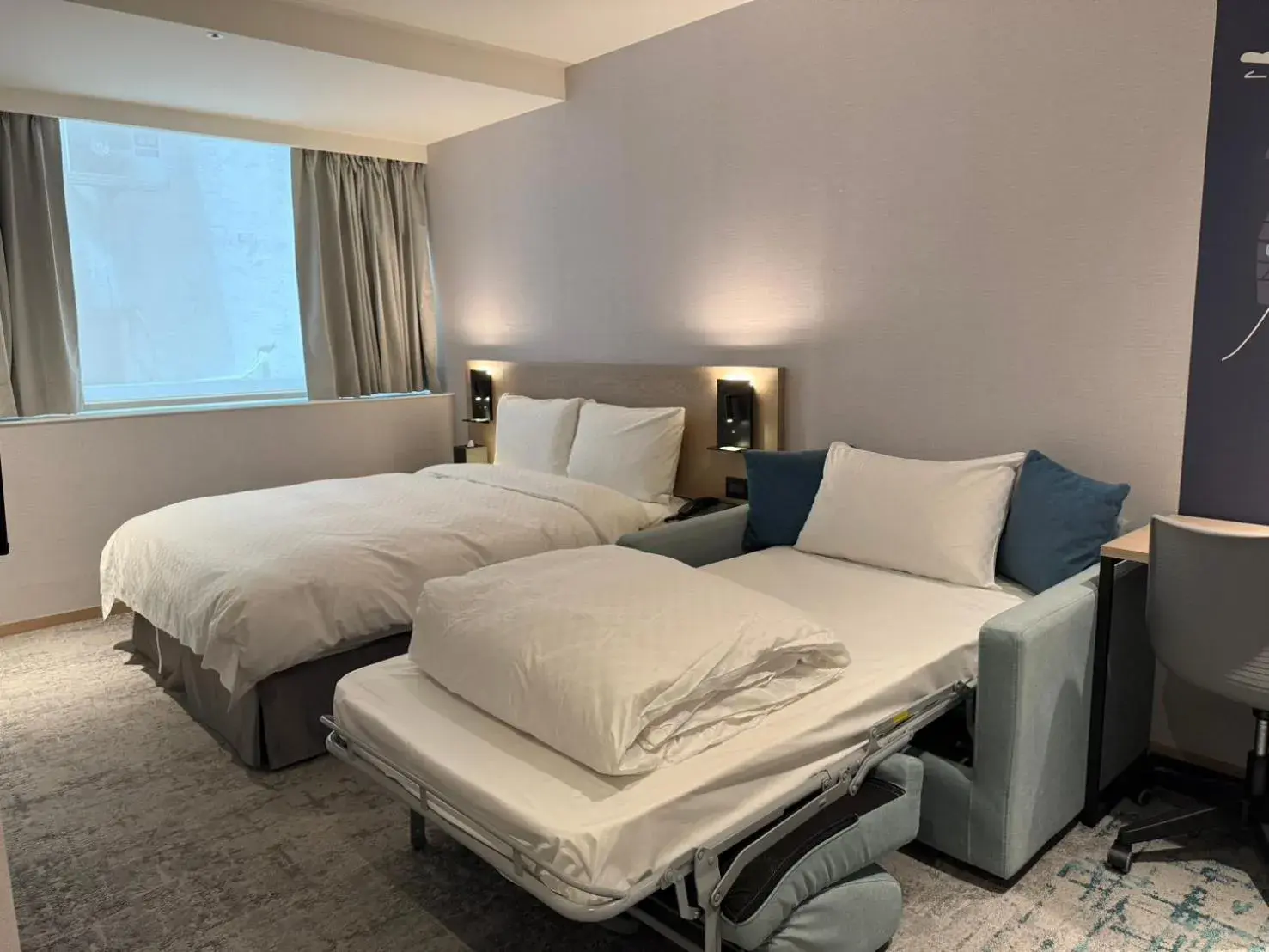 Power Triple with Sofa Bed in Tango Inn Taipei Kaifong Power Triple with Sofa Bed in Tango Inn Taipei Kaifong