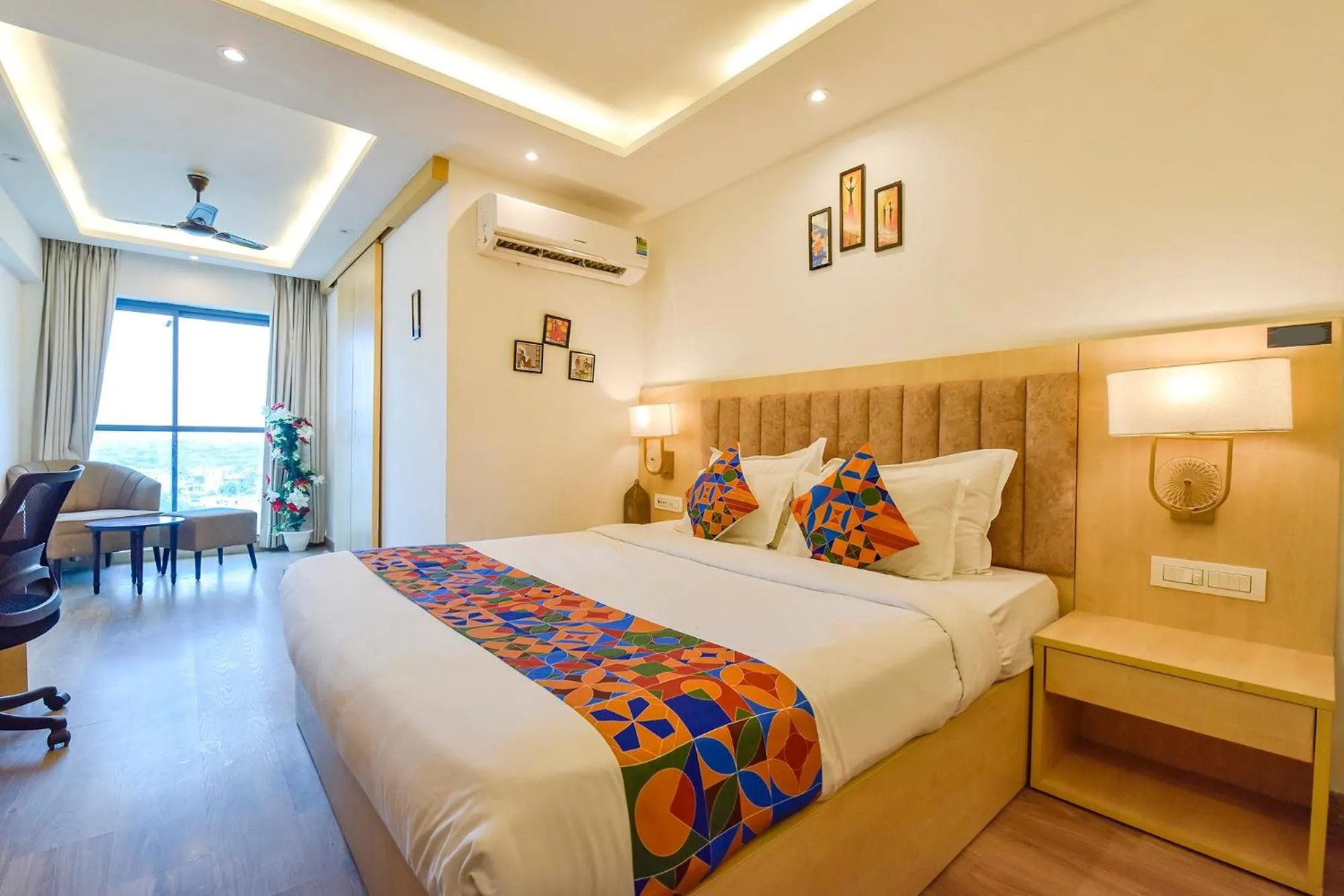 Bed in FabHotel Anukampa With Swimming Pool
