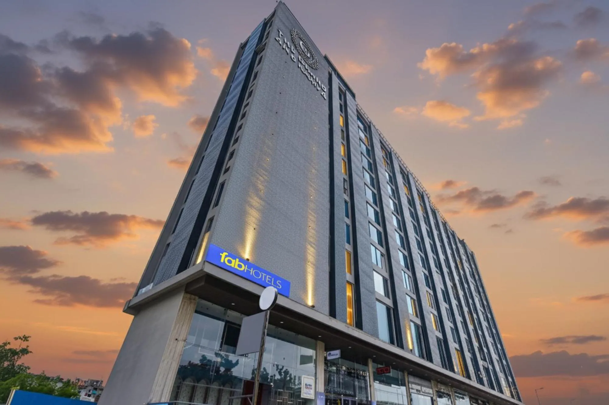 Property building in FabHotel Anukampa With Swimming Pool