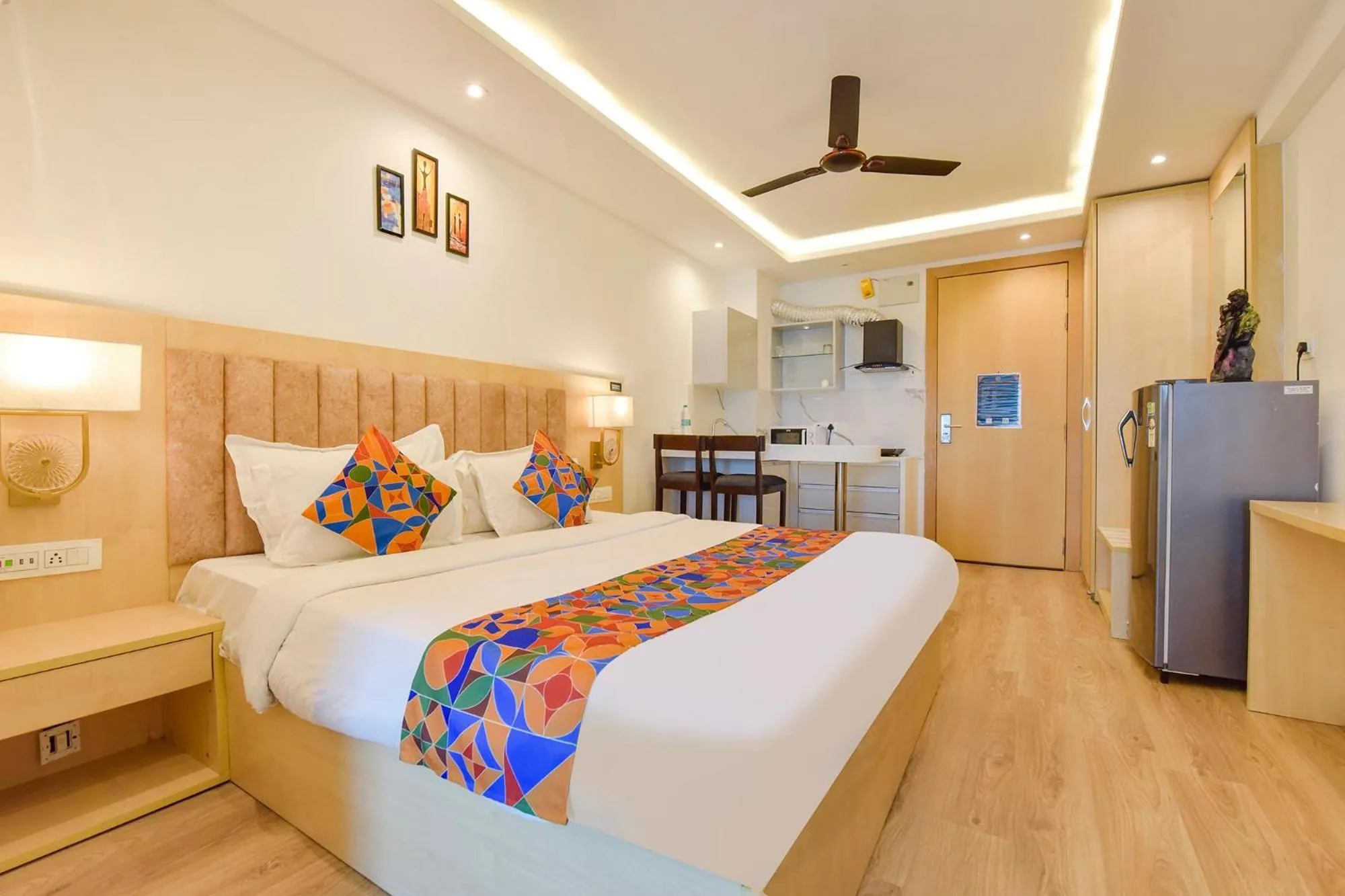 Bed in FabHotel Anukampa With Swimming Pool