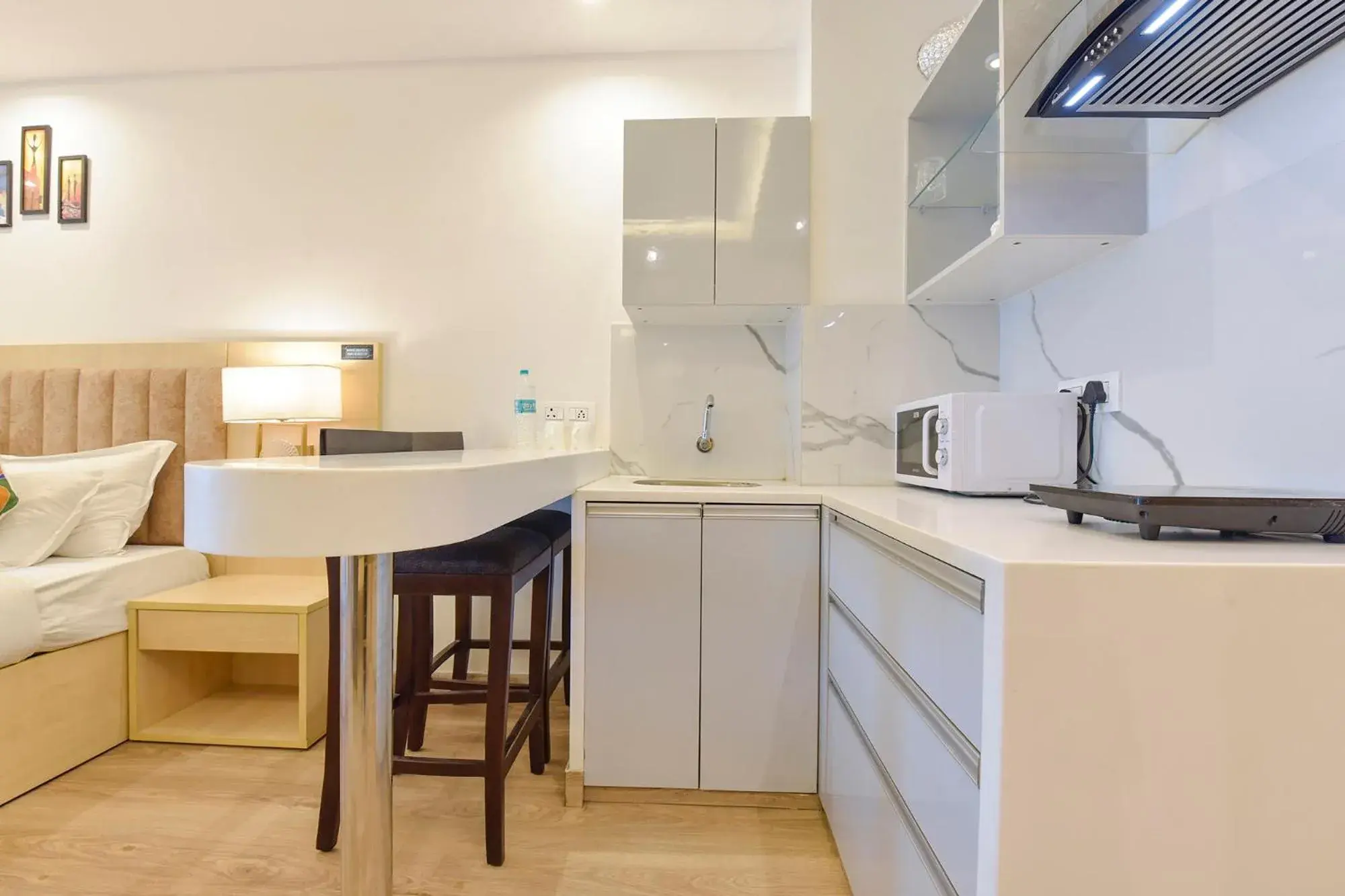 Bedroom in FabHotel Anukampa With Swimming Pool Bedroom in FabHotel Anukampa With Swimming Pool