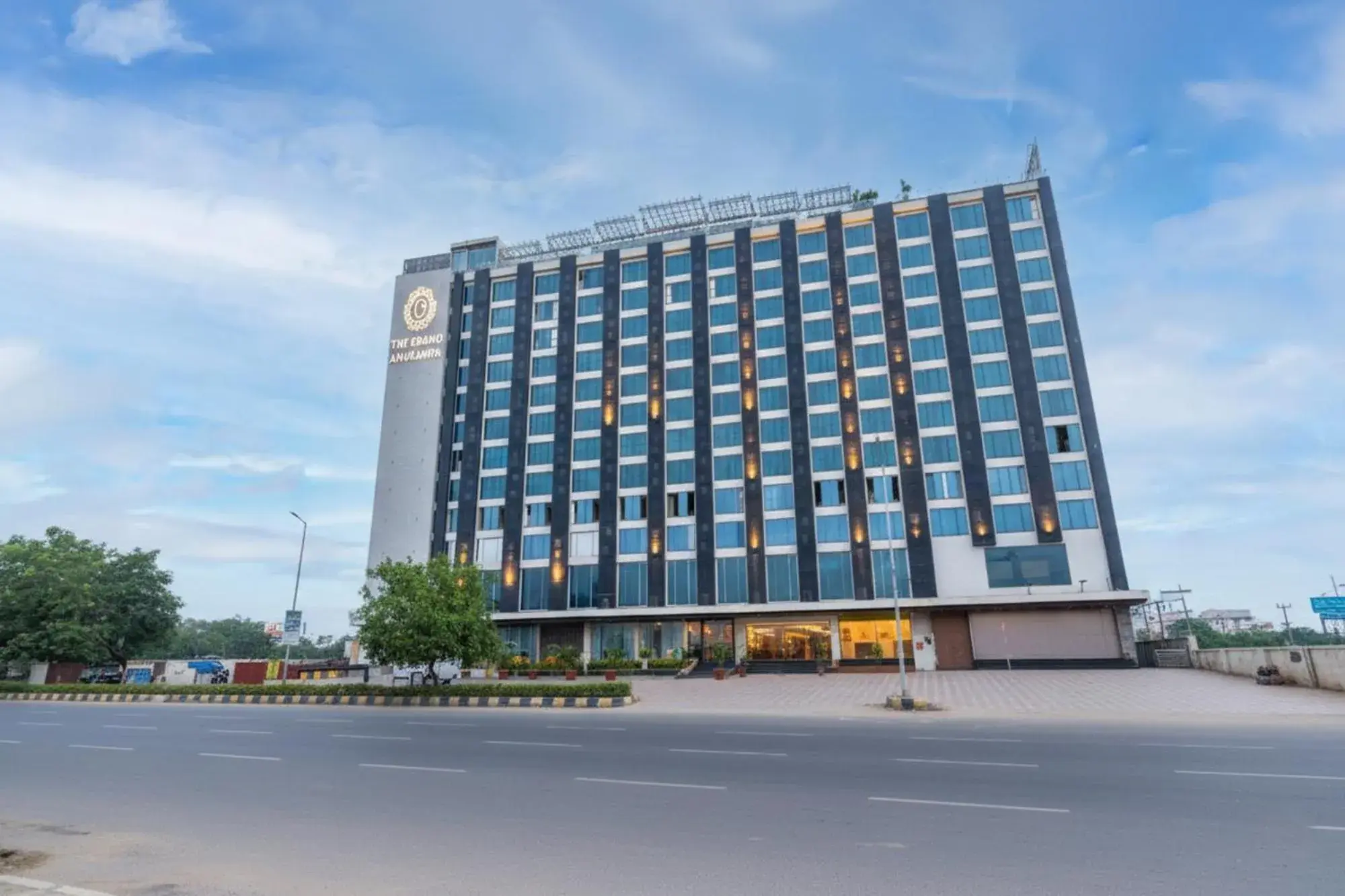 Property building in FabHotel Anukampa With Swimming Pool Property building in FabHotel Anukampa With Swimming Pool