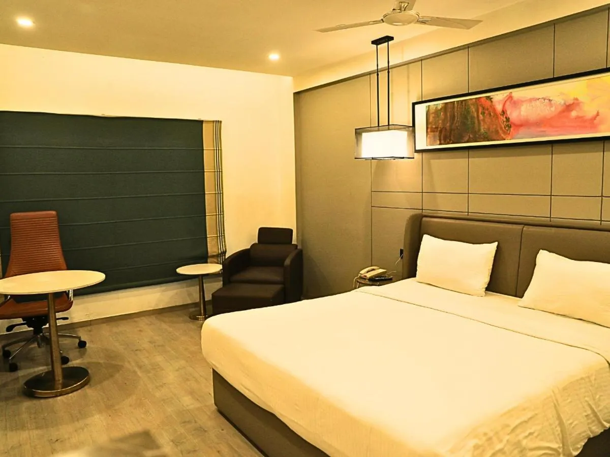 Photo of the whole room, Bed in D R Utthama Nellore - AM Hotel Kollection