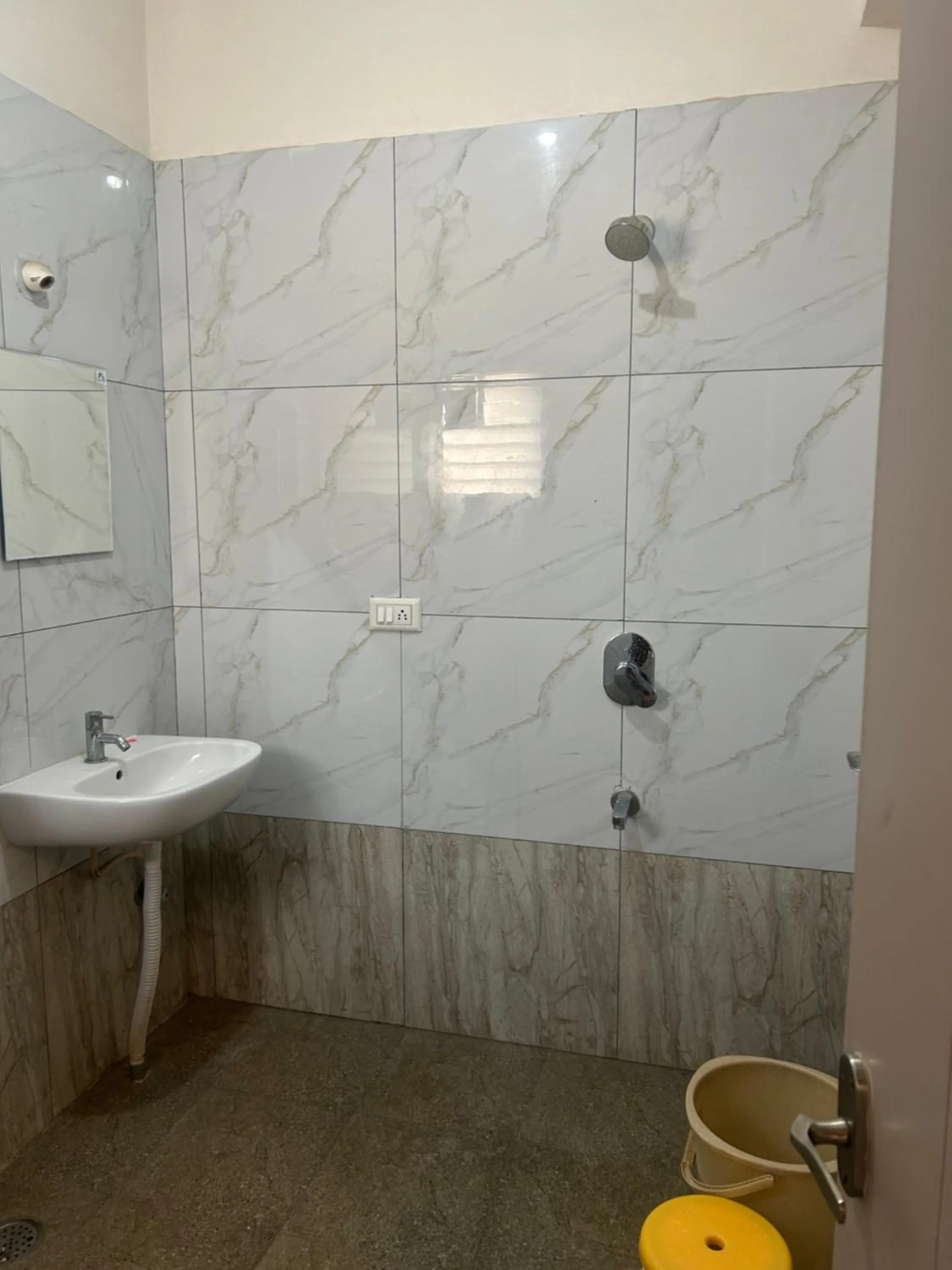 Shower in M S Comforts