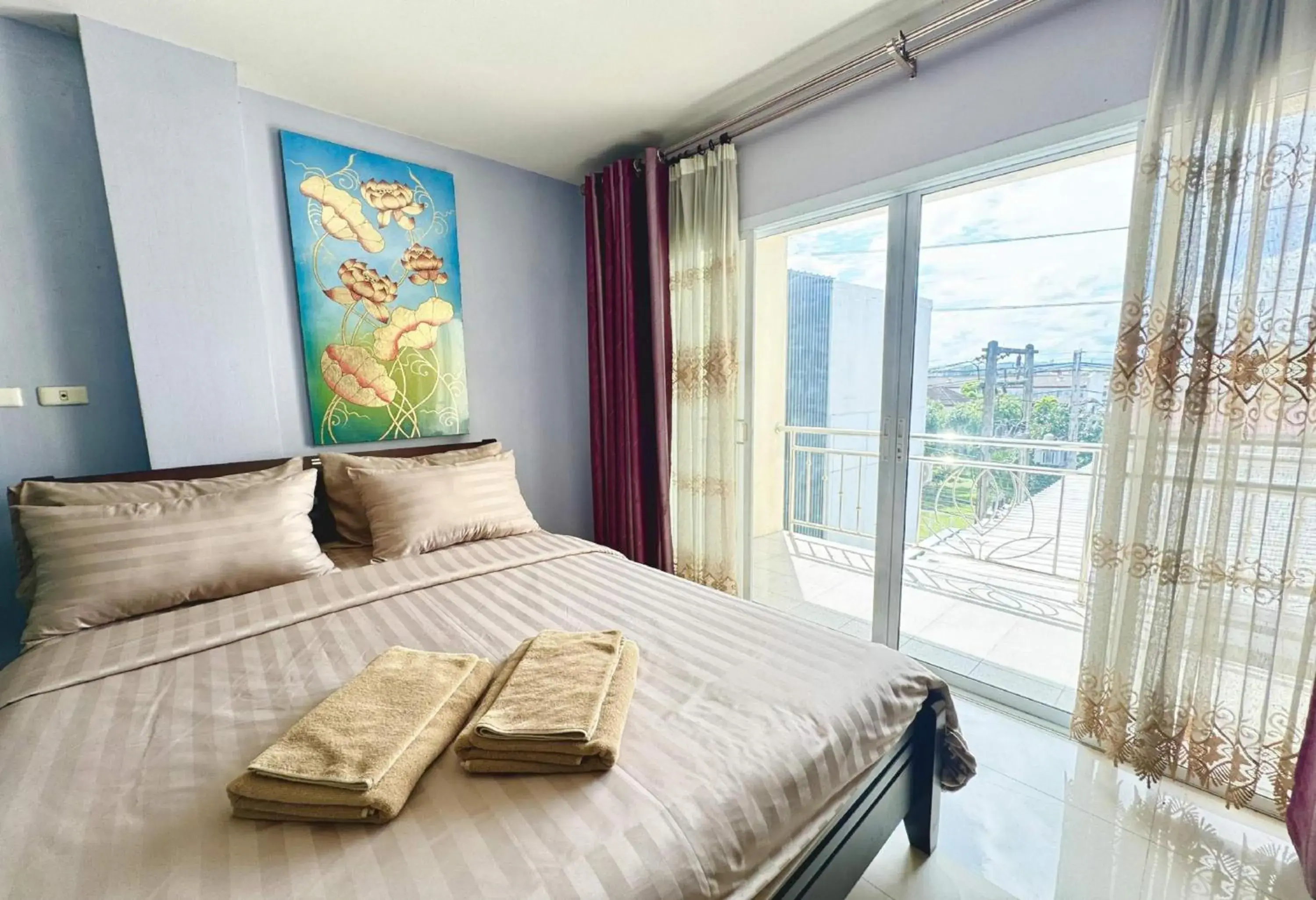 Photo of the whole room, Bed in Collection O Bupamontra Chiangmai Photo of the whole room, Bed in Collection O Bupamontra Chiangmai