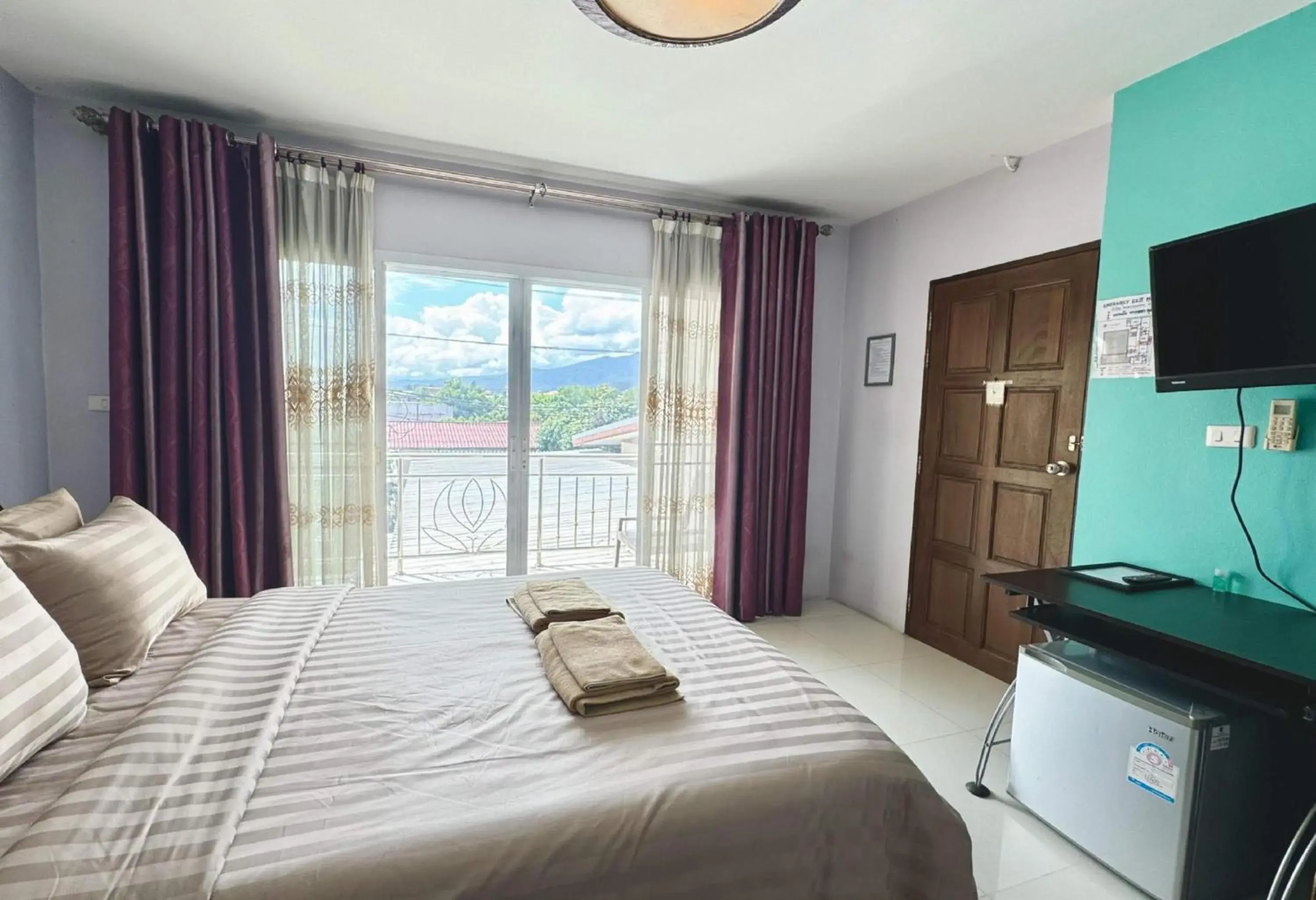 Photo of the whole room, Bed in Collection O Bupamontra Chiangmai Photo of the whole room, Bed in Collection O Bupamontra Chiangmai