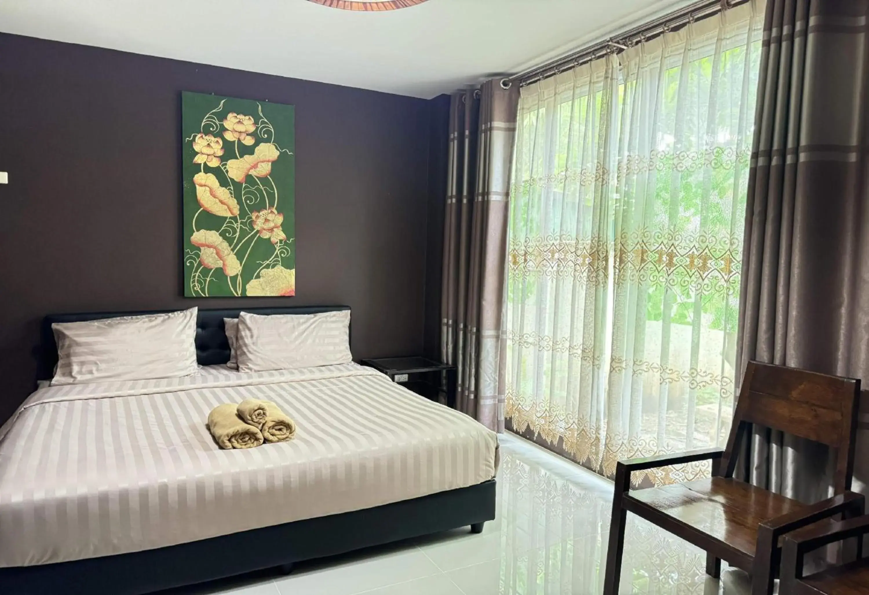 Photo of the whole room, Bed in Collection O Bupamontra Chiangmai Photo of the whole room, Bed in Collection O Bupamontra Chiangmai