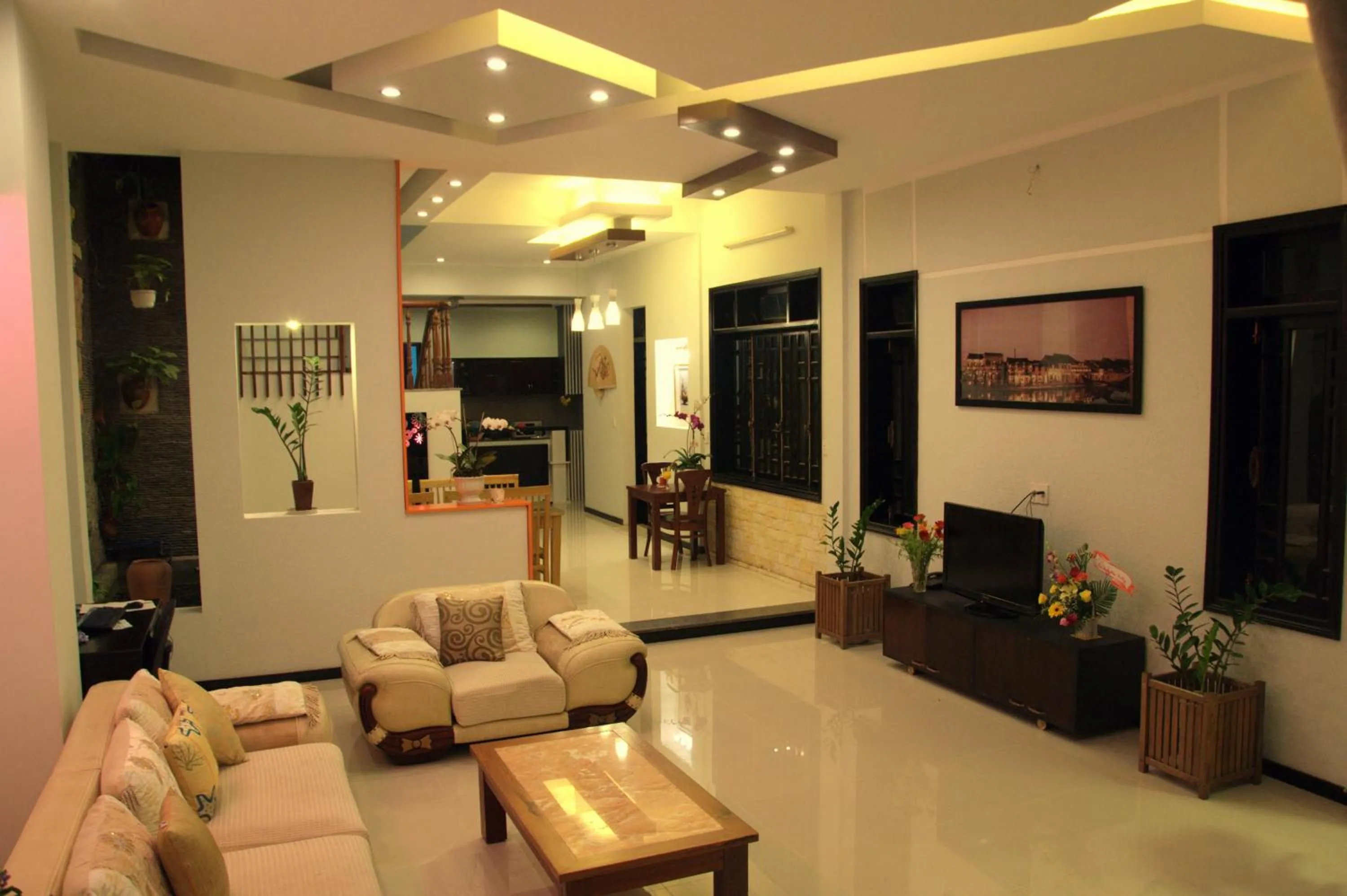 Communal lounge/ TV room in Green CoCo HomeStay