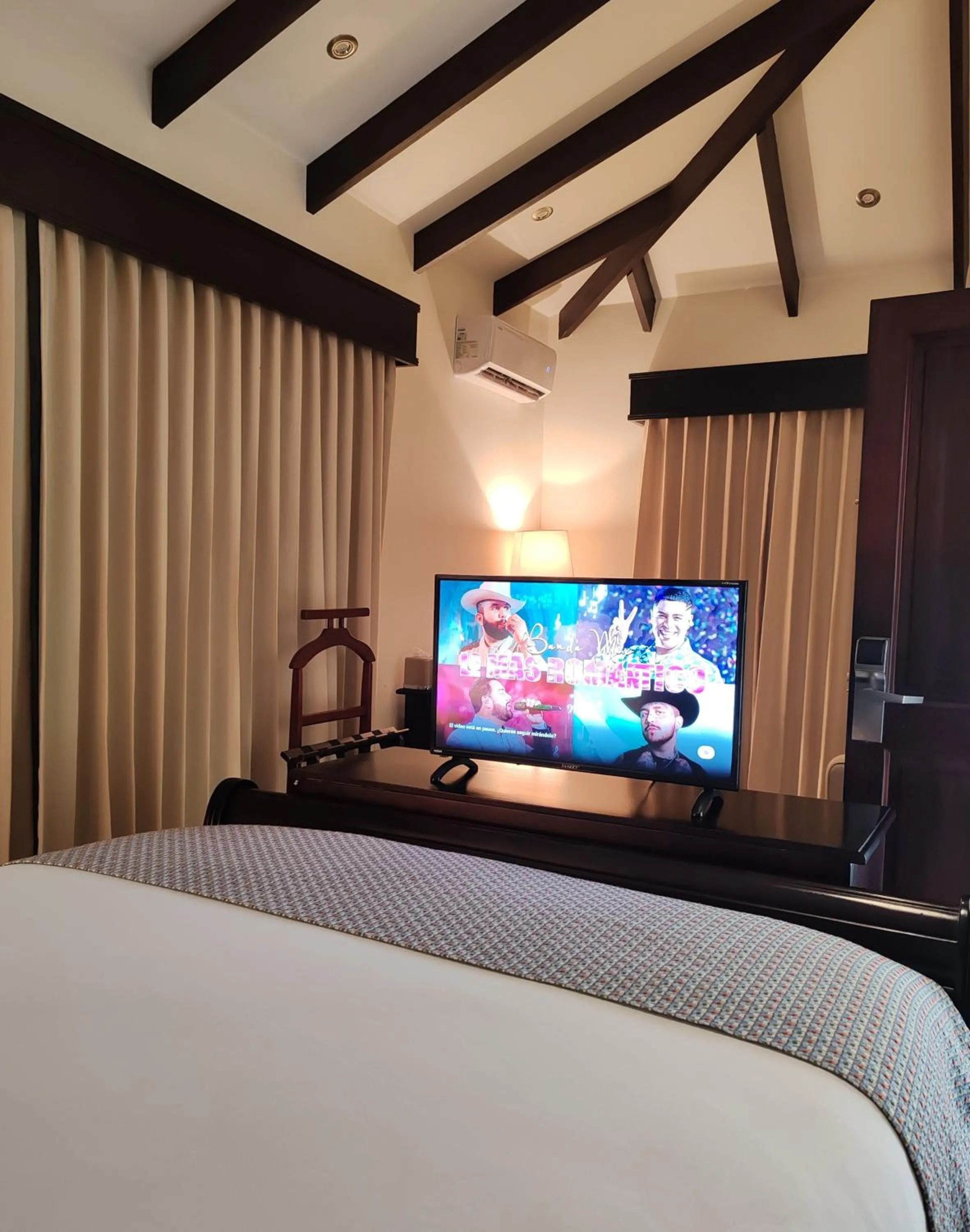 Bed in Marenaz Oceanfront Resort