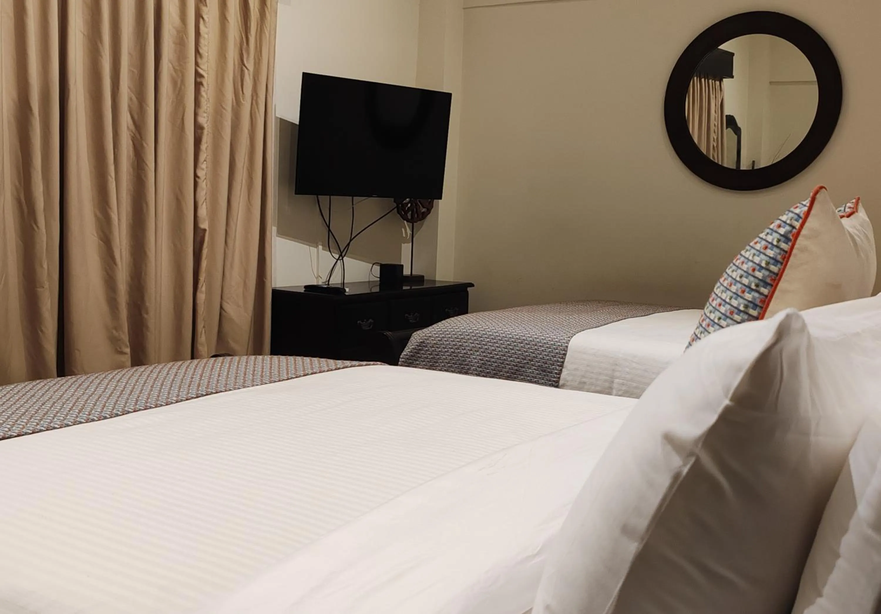 Bed in Marenaz Oceanfront Resort