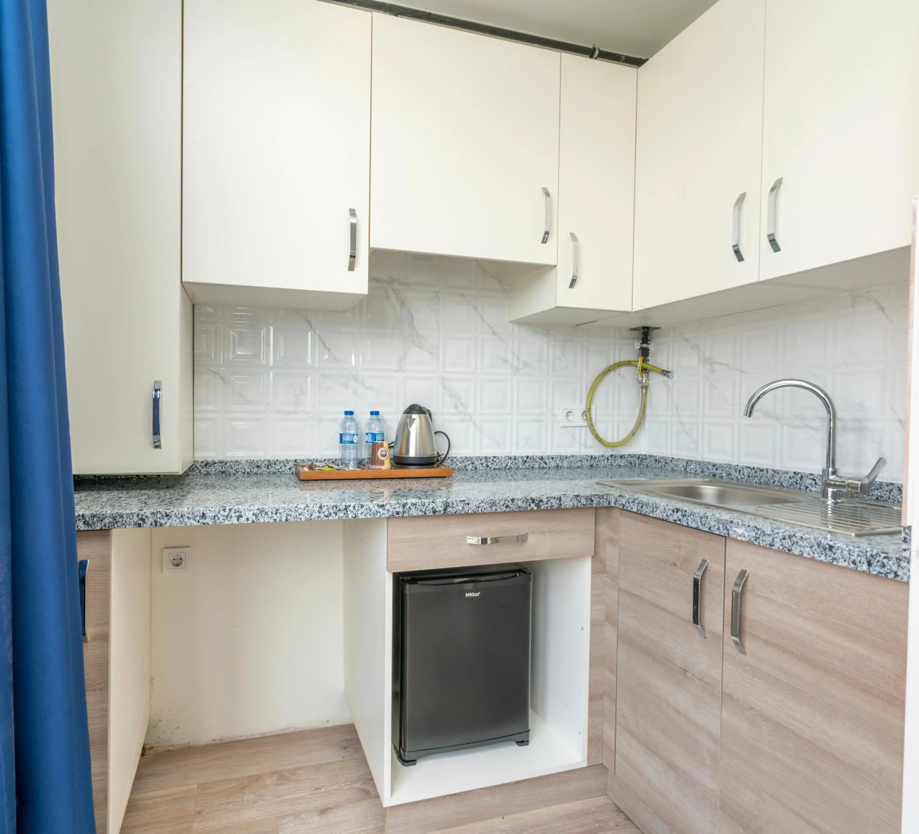 Kitchen or kitchenette in Guest Suites