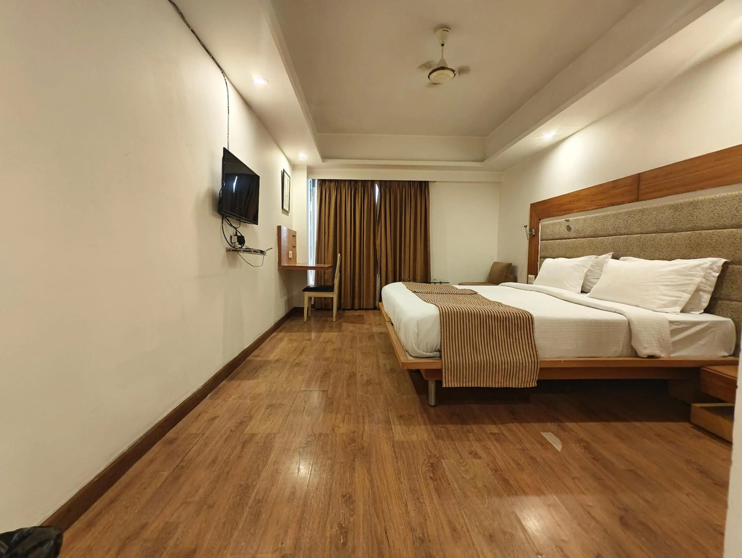 Photo of the whole room in The Sky Comfort, Ahmedabad