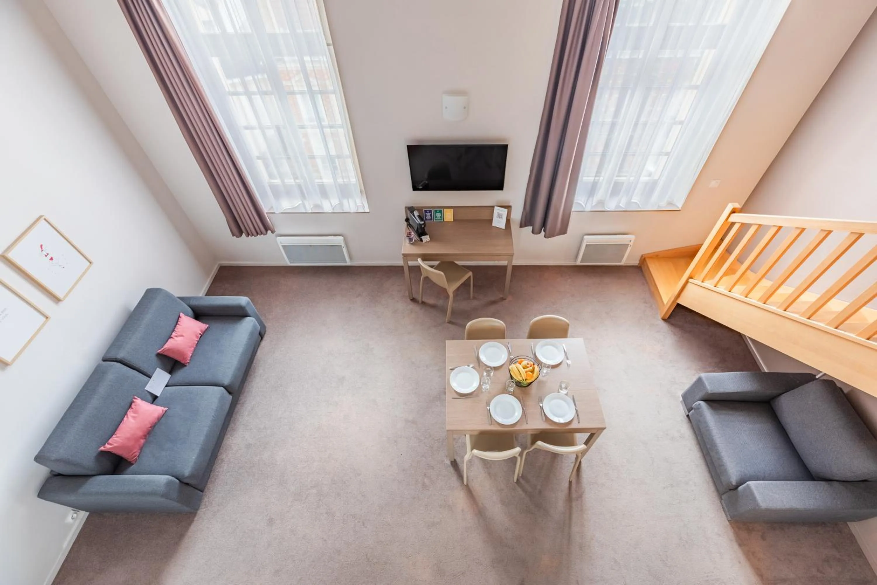 Living room in Appart’City Confort Reims Centre