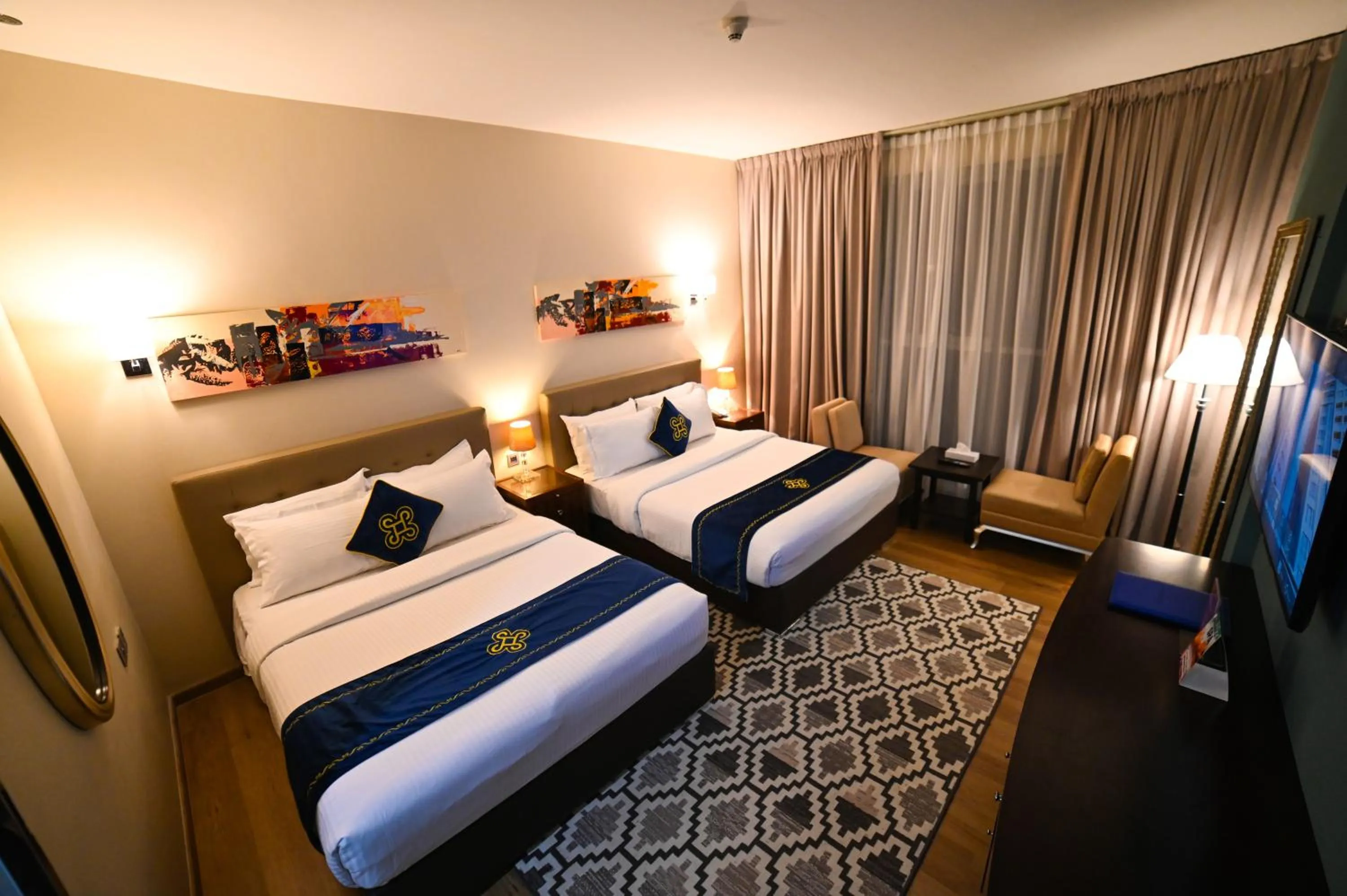 Bed in Seven Seas Hotel