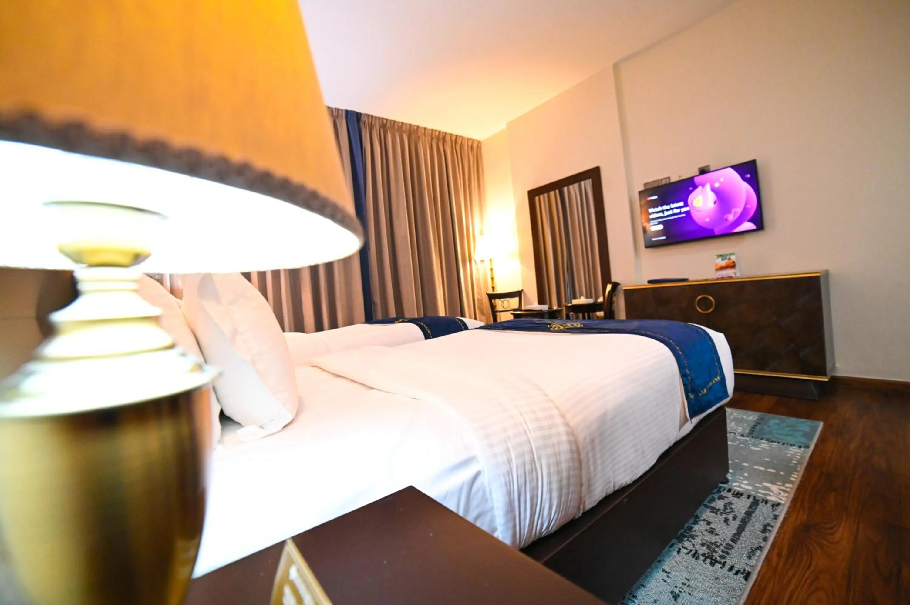 Bed in Seven Seas Hotel