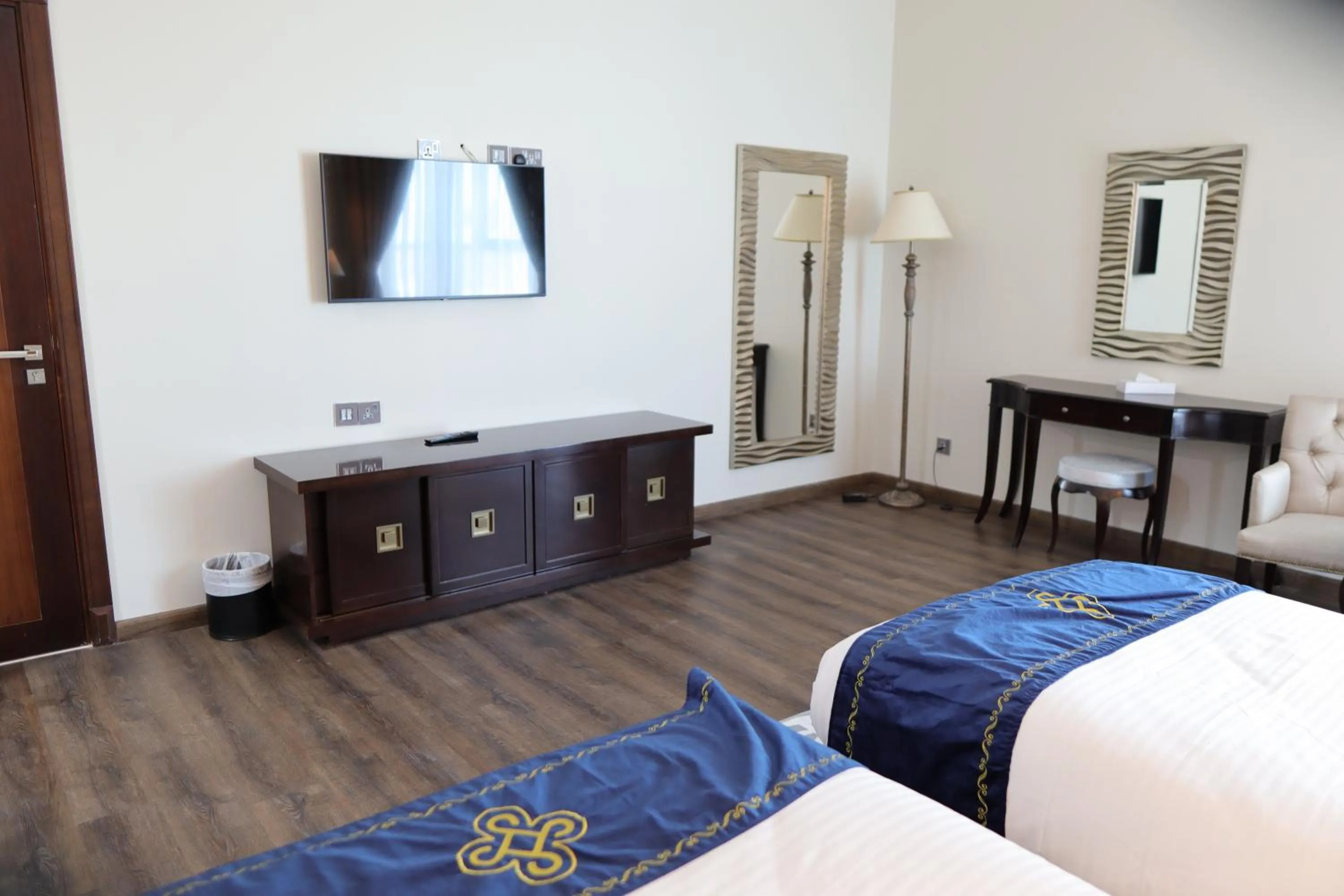 Bed in Seven Seas Hotel