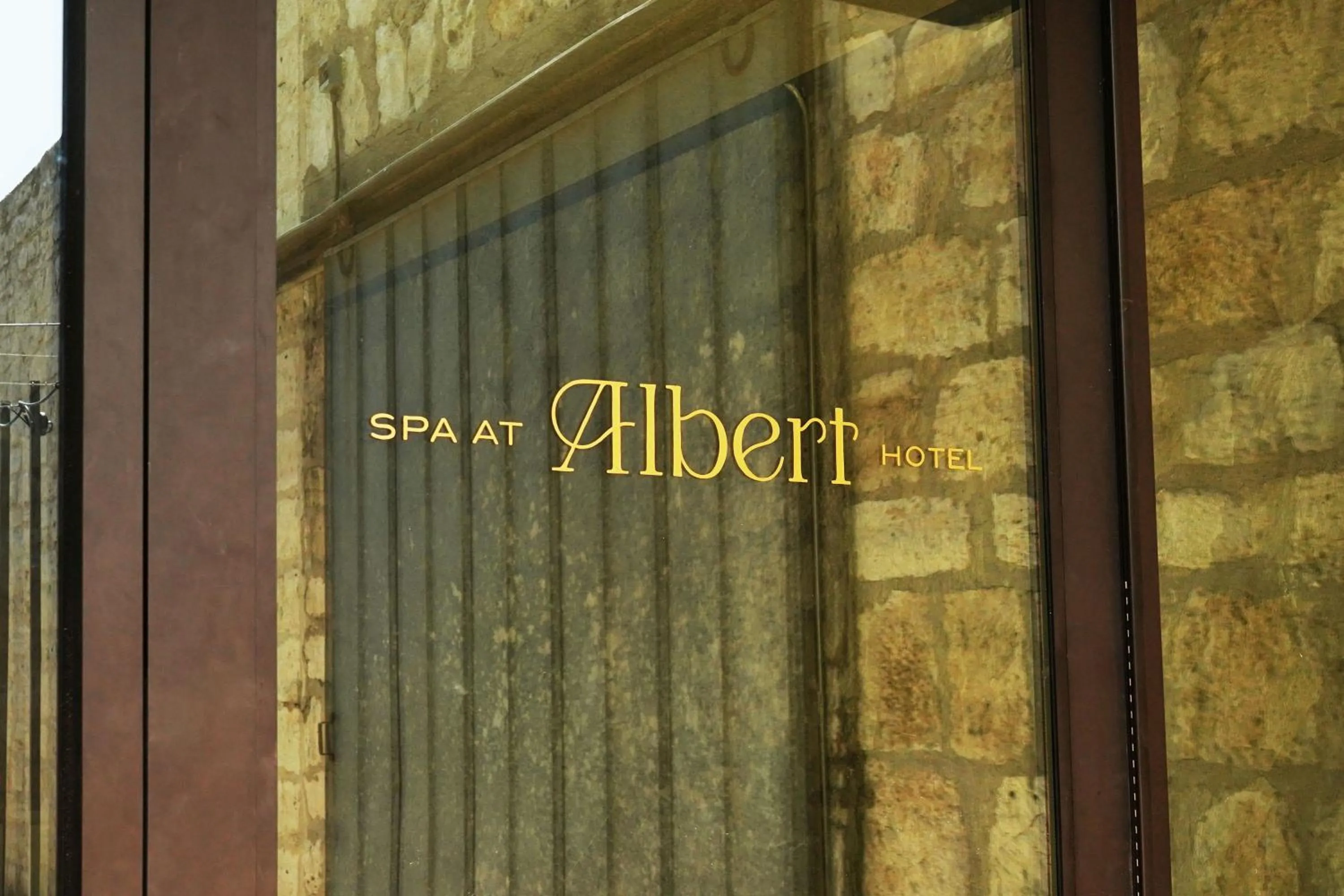 Property logo or sign in Albert Hotel