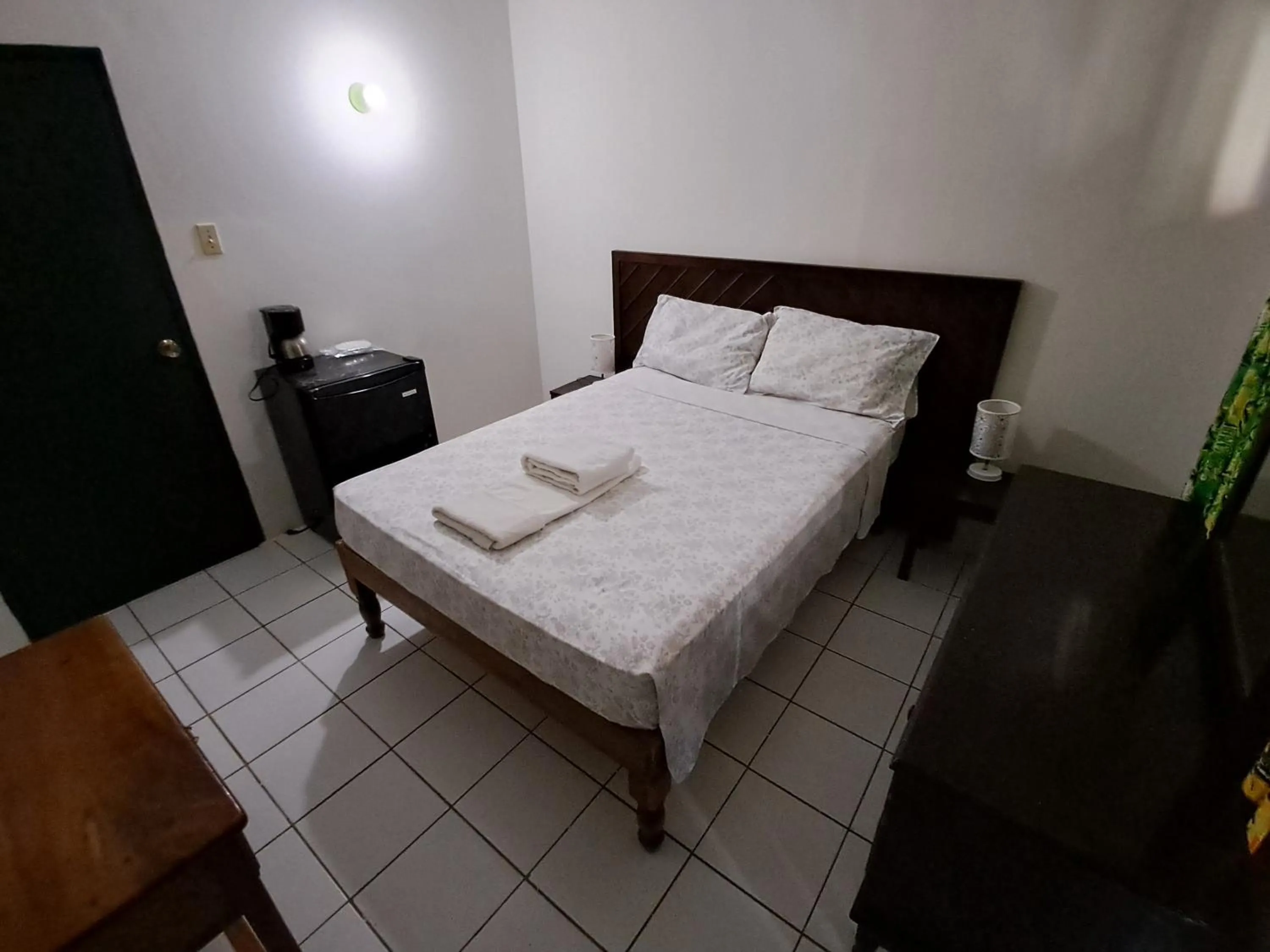 Bed in Barry's Rooms Negril