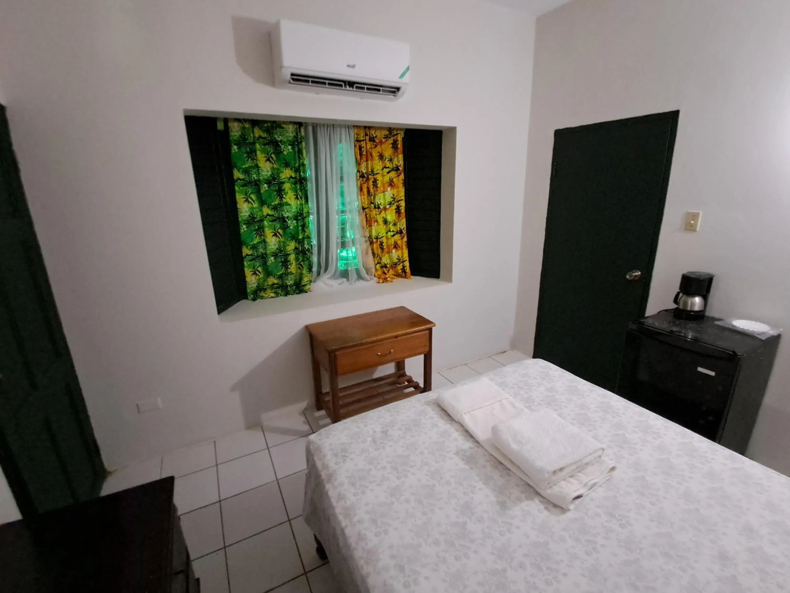 Bed in Barry's Rooms Negril
